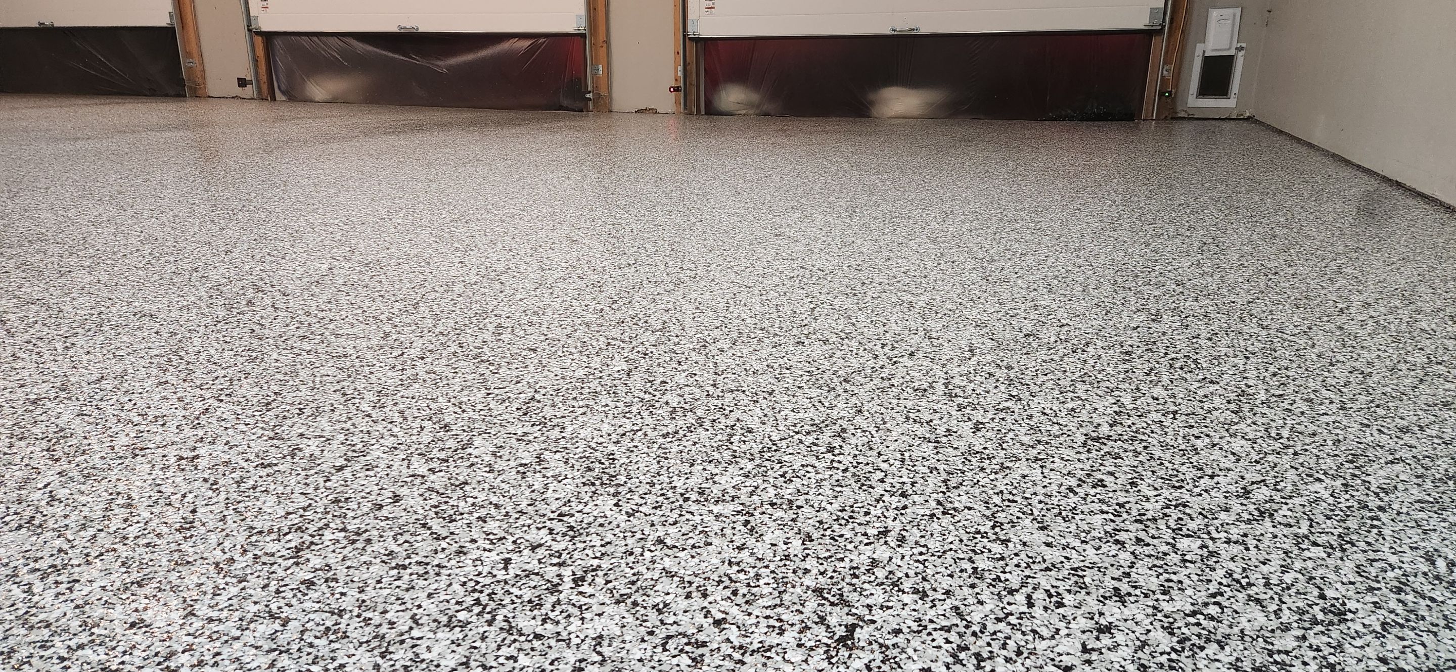 Garage using Domino by Elite Floor Solutions