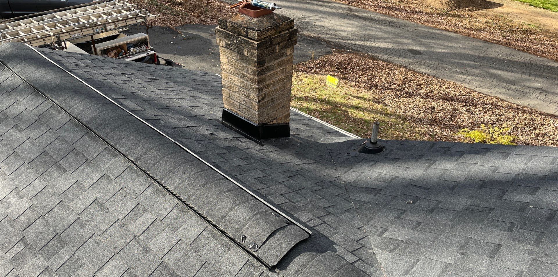 Residential Roofing Installation using Certainteed Landmark, Moire Black by RJC General Construction, LLC.