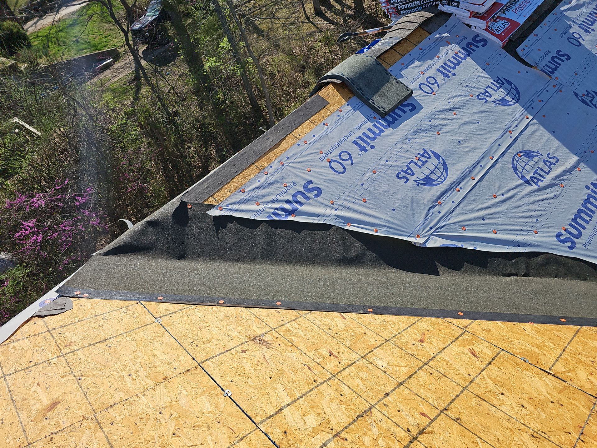 Residential Roofing & Gutter Cover Install  by Titan Commercial & Residential Roofing 