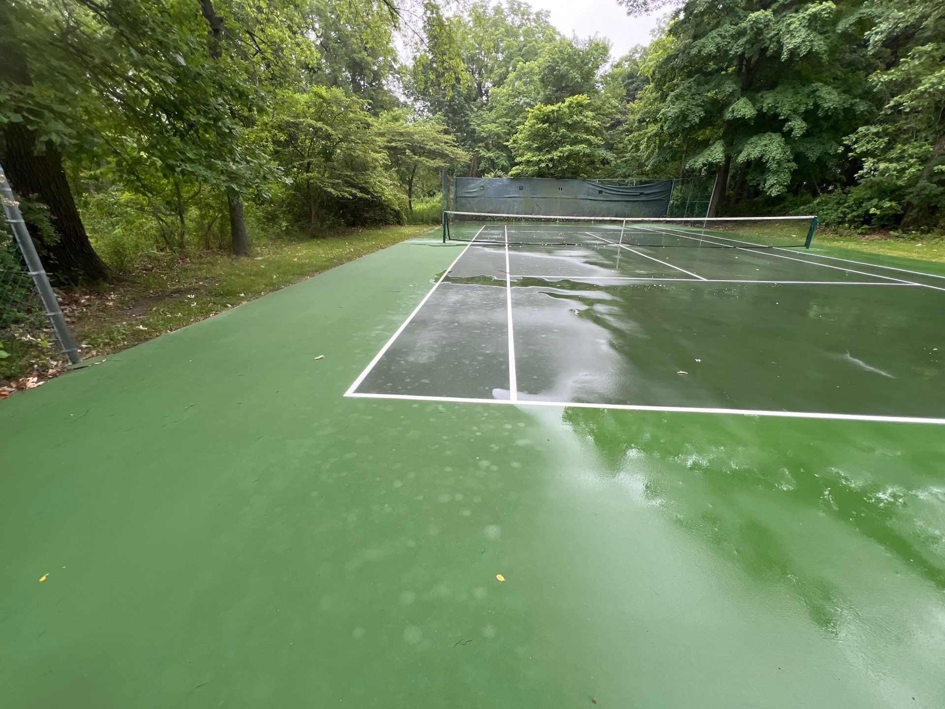 Deck, Patio, and Tennis Court Cleaning by Northern Power Washing LLC.