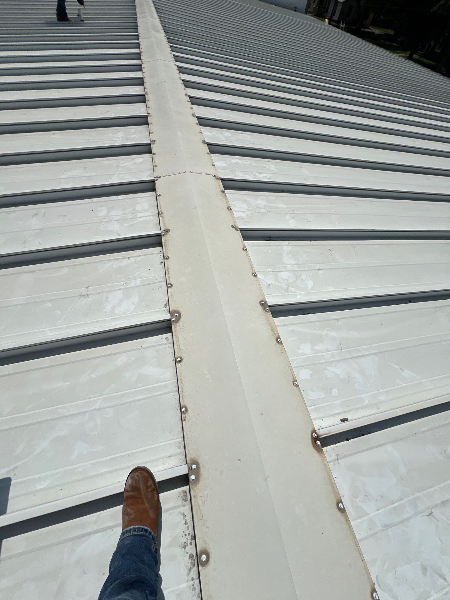 Commercial Roofing Repair using Metal by Roof Repair Company