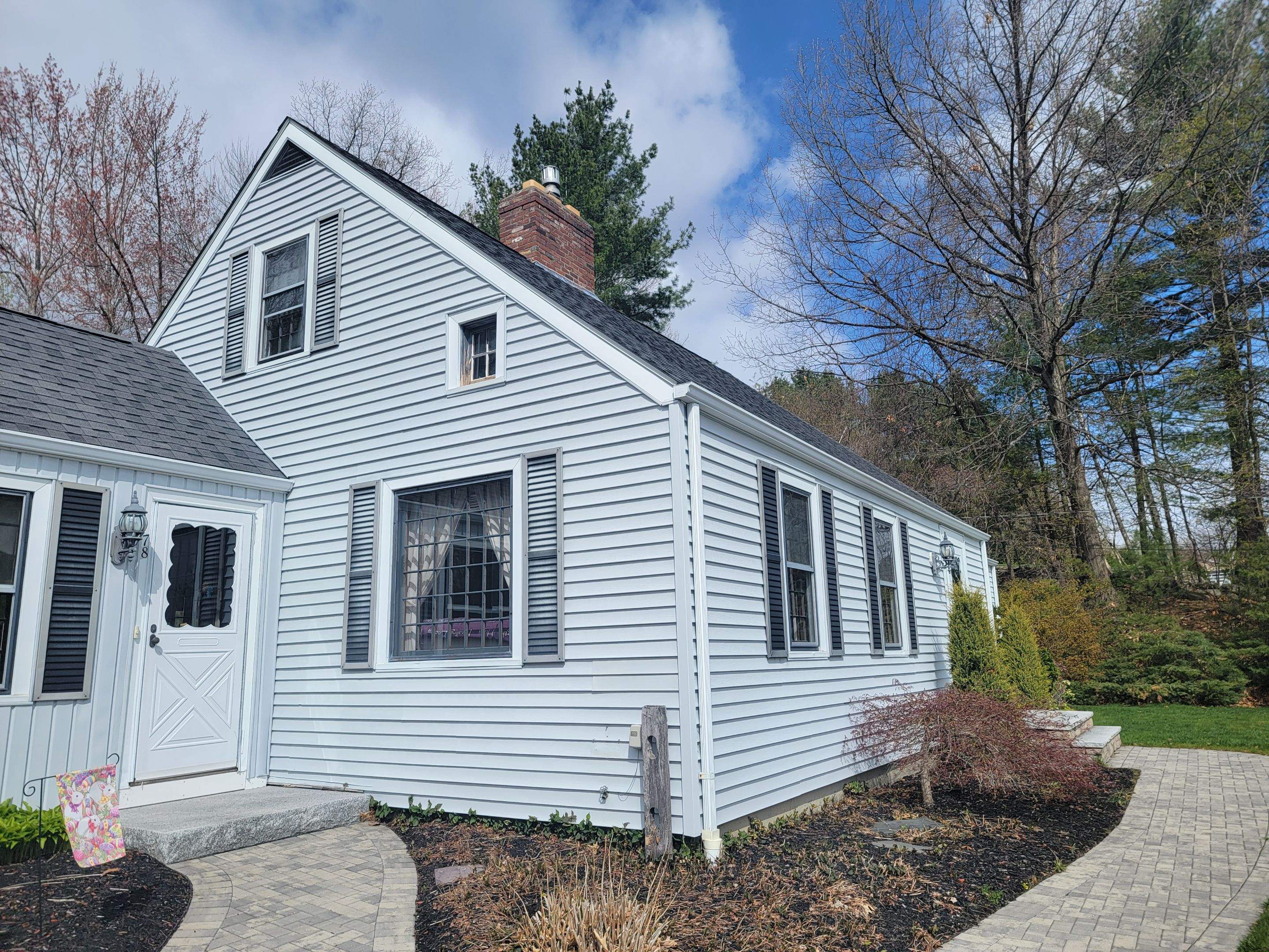 Siding Installation using James Hardie Countrylane red by UBrothers Construction