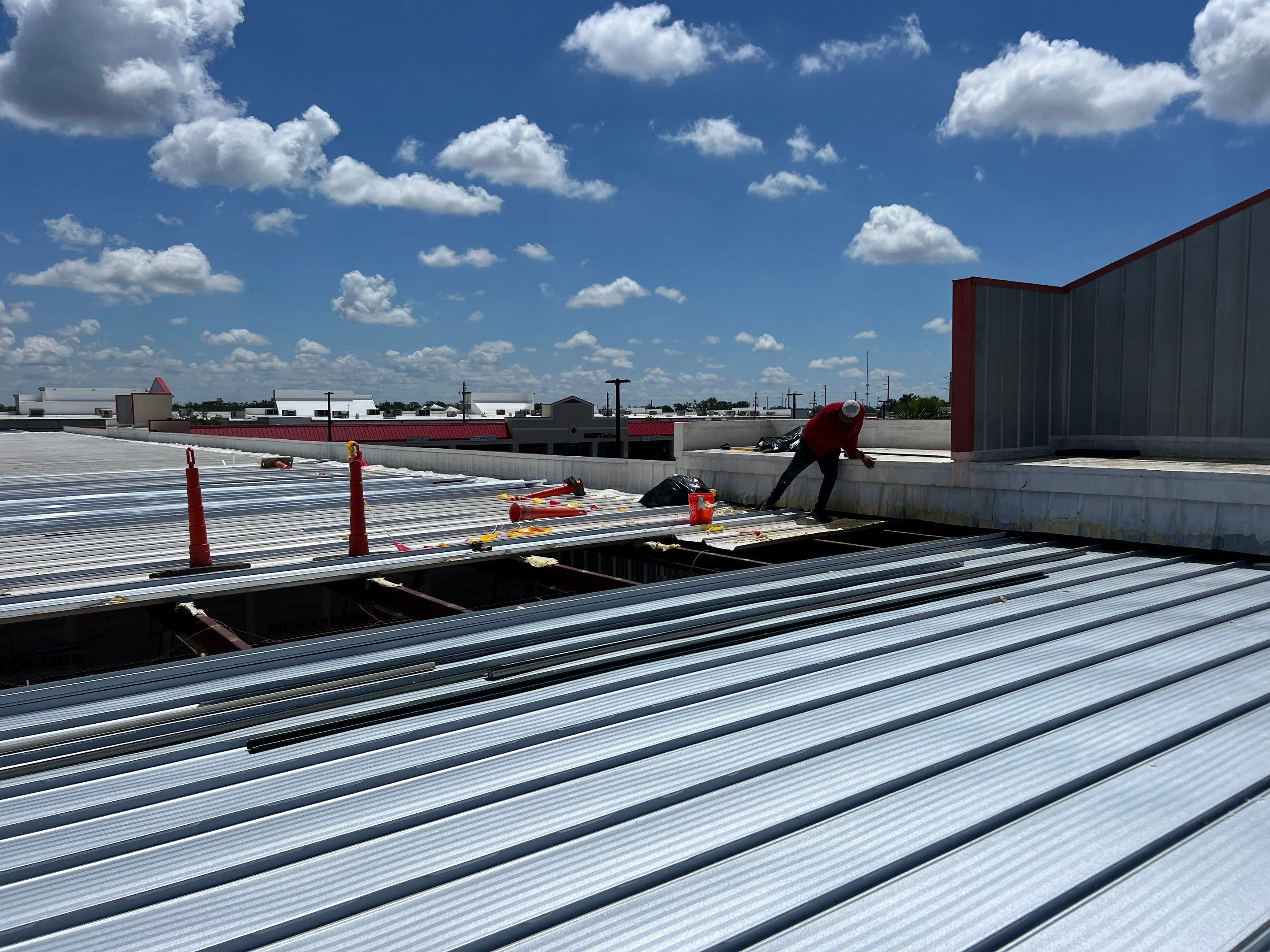 Commercial Metal Roof Replacement at Shopping Plaza in Port Charlotte by CES Roofing