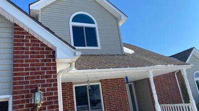 Window Installation using Heartland Triple Pane windows and sliding Patio doors