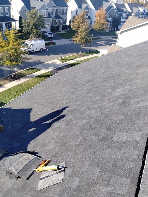 Residential Roofing Installation using Atlas Pinnacle Pristine Black Architectural Shingles by Frederick Roof Repair