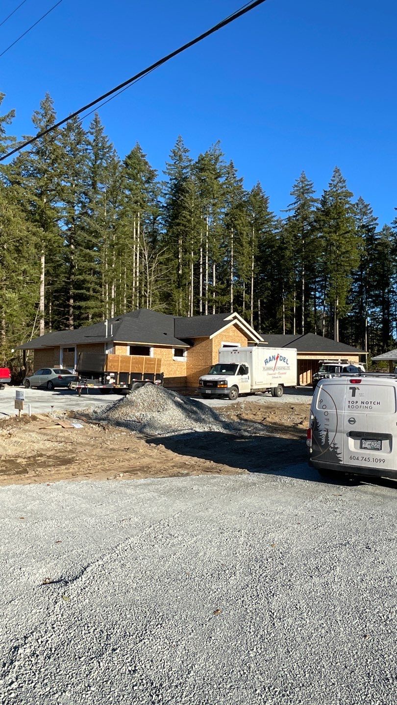 Residential Roofing Installation using OC Oakridge shingles by Top Notch Roofing Inc