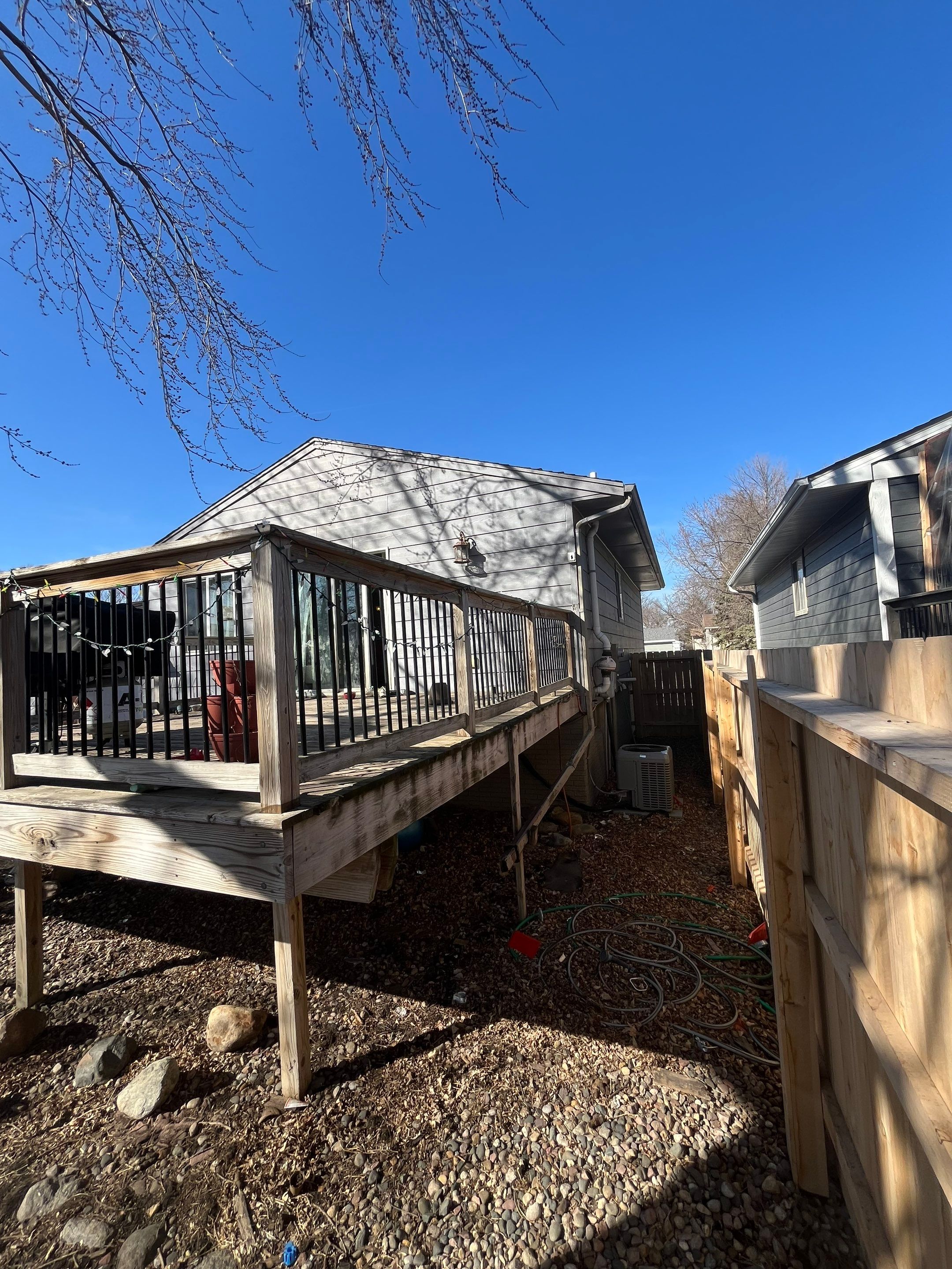 Full Exterior House Painting and Foundation Refinishing in Sioux Falls by Select Painting, Coatings & Garage Cabinets