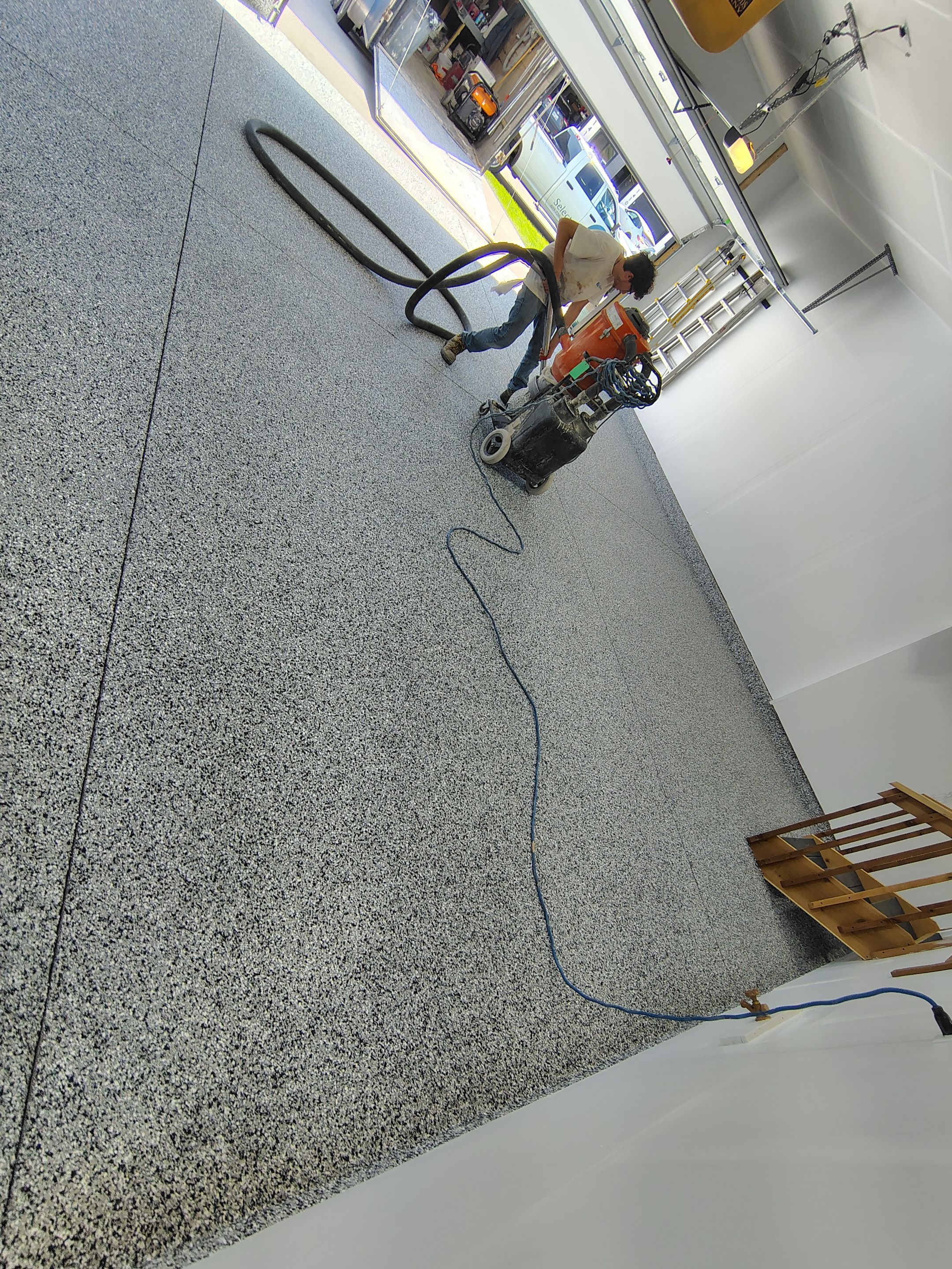 Decorative Flake Garage Floor Coating Installation in Tea, South Dakota by Select Painting, Coatings & Garage Cabinets