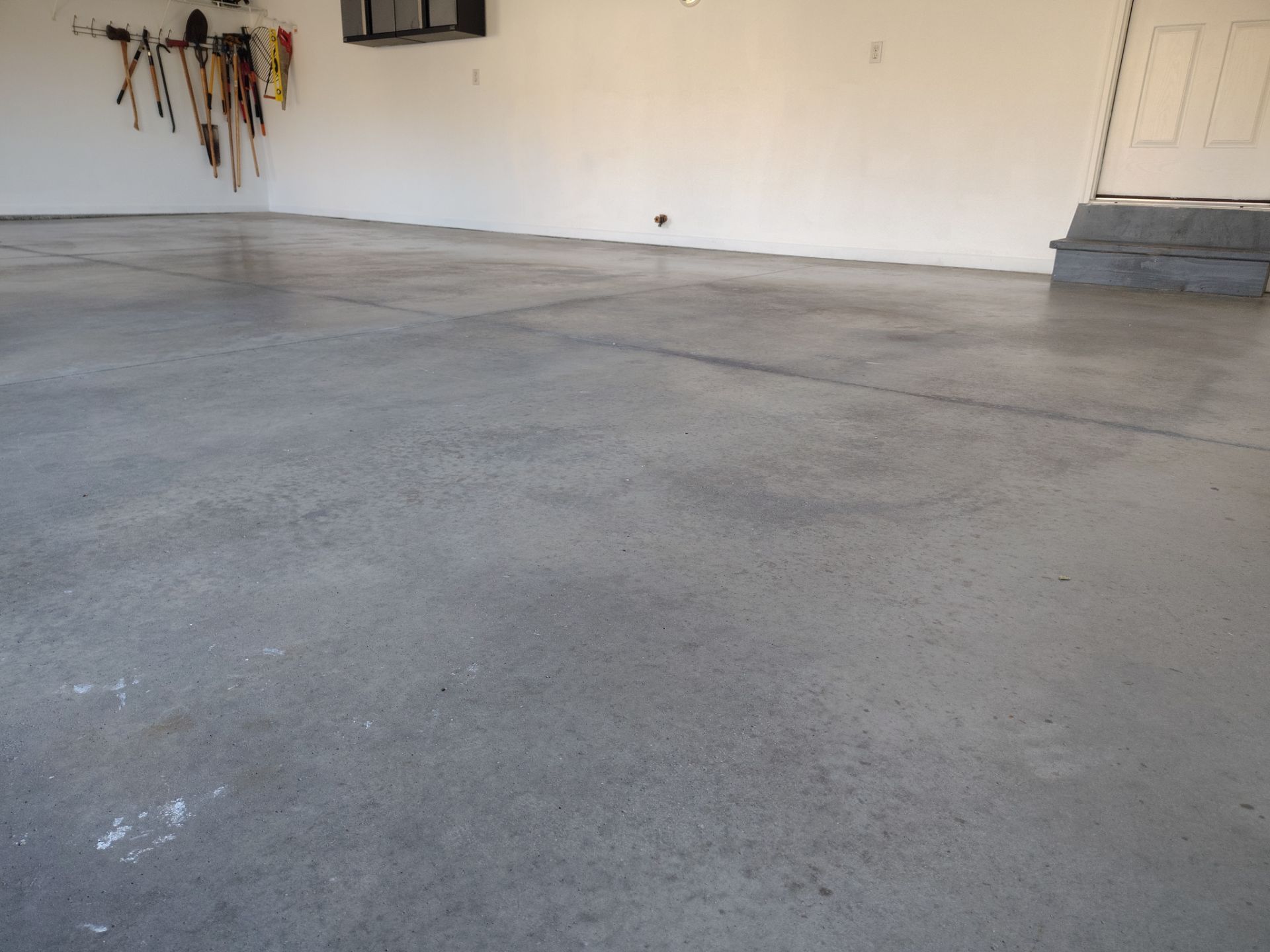 New Johnston Garage Resurfacing by Revival Concrete Coatings, LLC