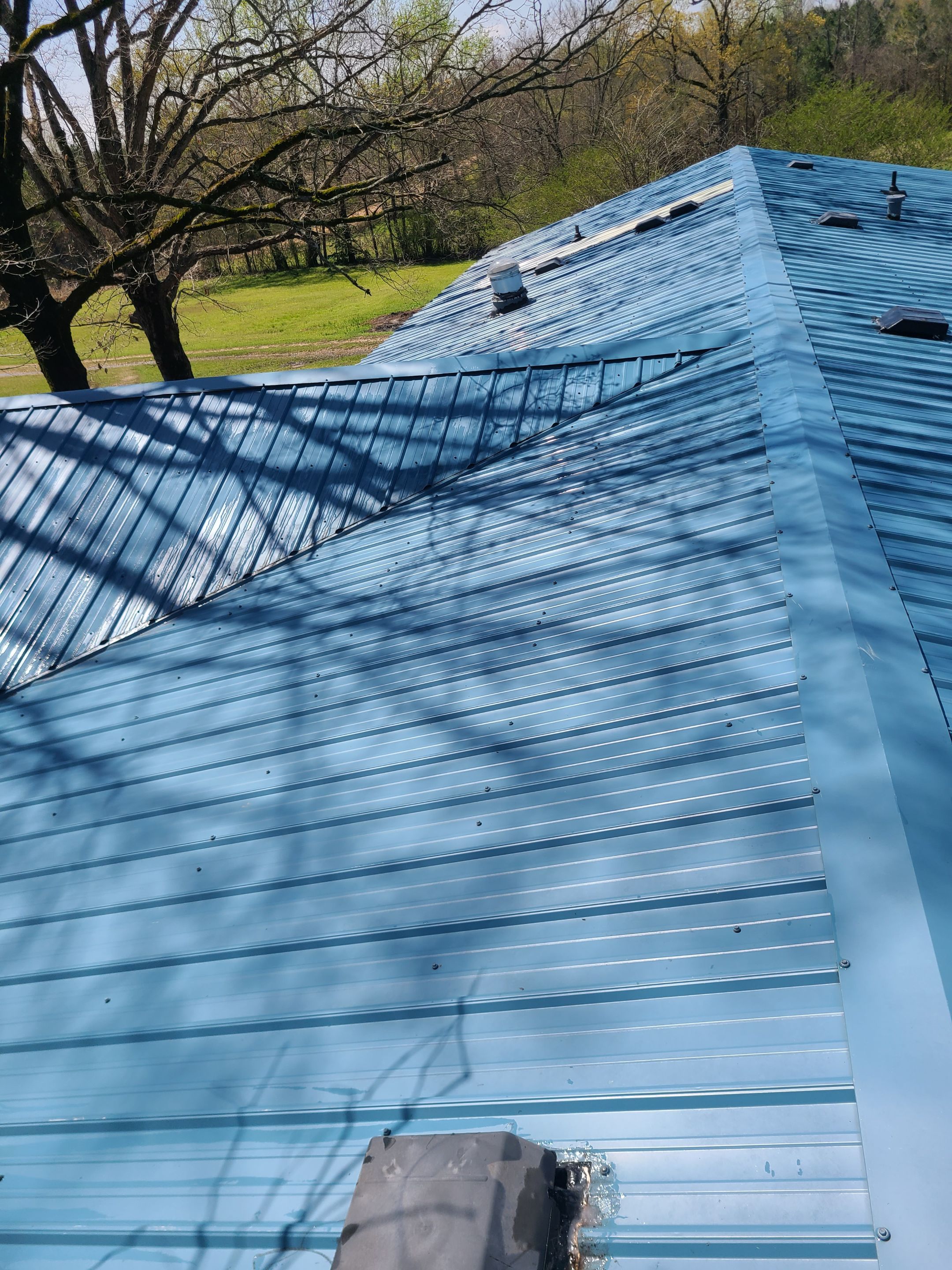 Commercial Roofing Installation using Aldocoat Coatings by Hostetler Roofing