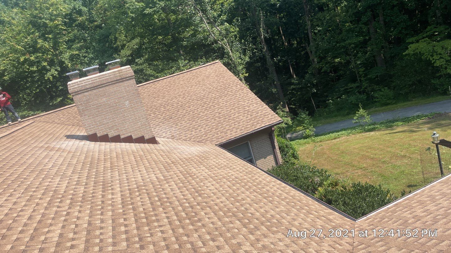 Roof Replacement using GAF Timberline HDZ by American Home Contractors