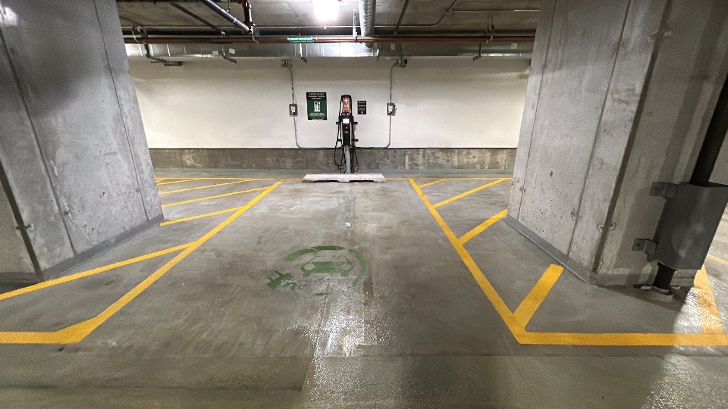 Parking garage using Hot water by Northern Power Washing LLC.