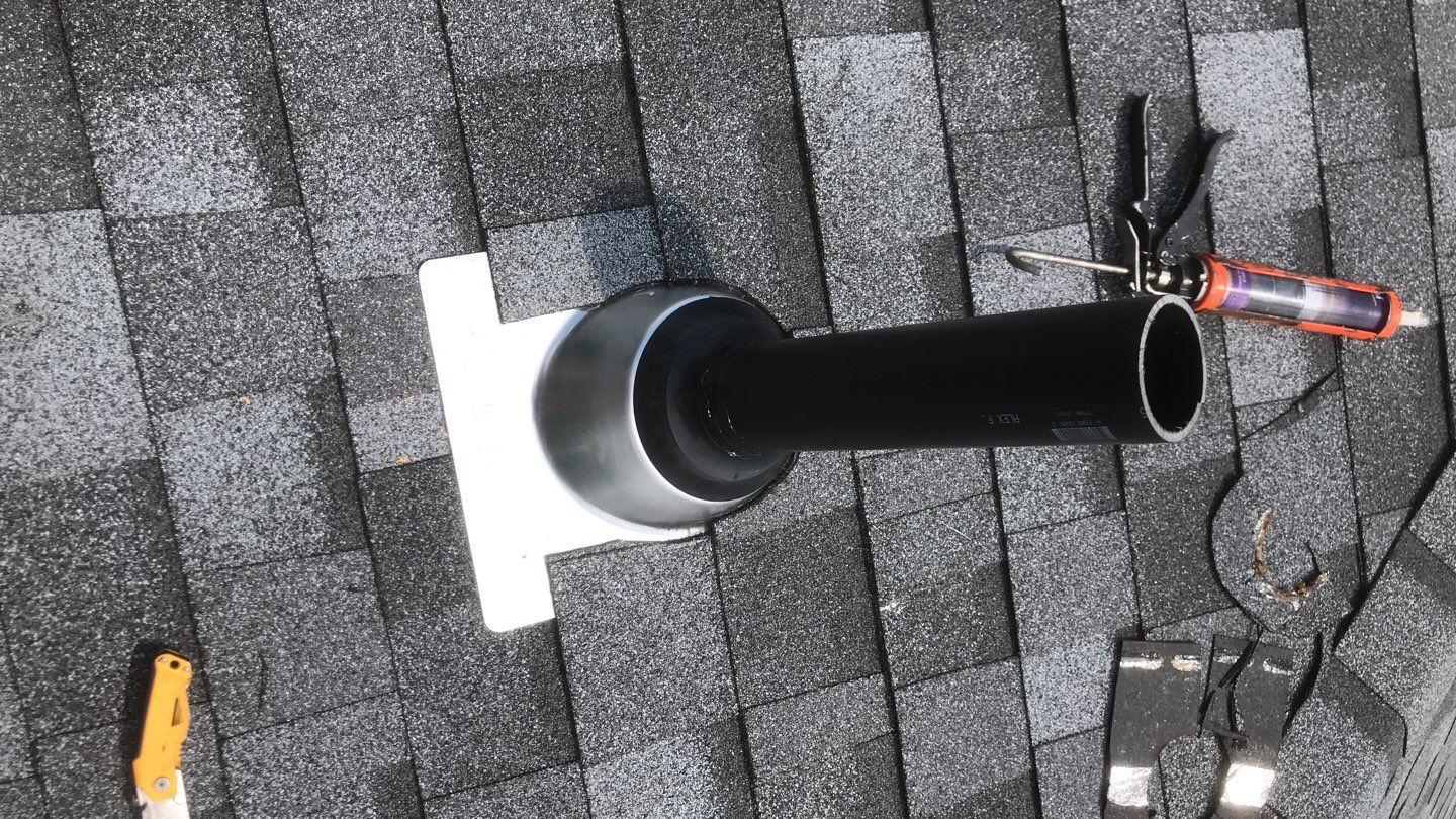 Commercial Roofing Installation using EPDM with white gutters by A Plus Exterior