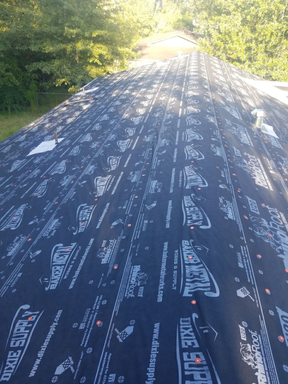 Residential Roofing Installation using Metal roofing by American Roofing & Construction LLC