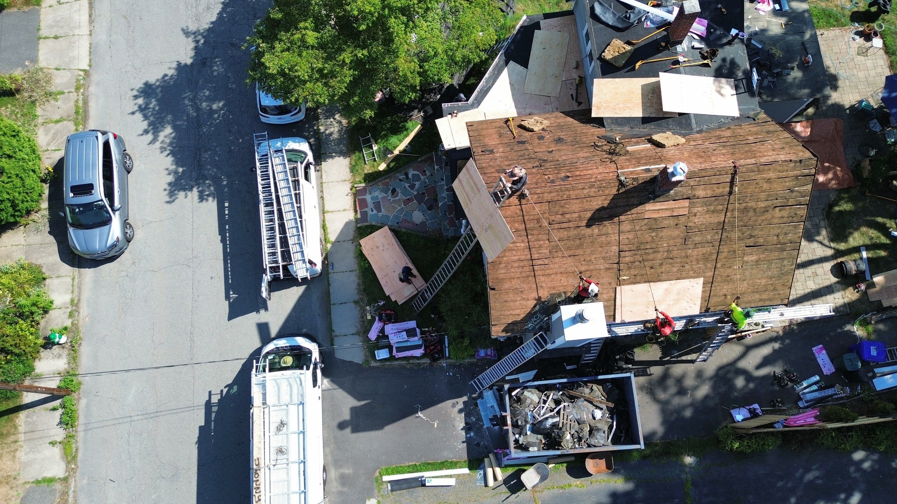 Full Roof Replacement + Custom Gutter Install | Onyx Black Finish by Mighty Dog Roofing of Greater Middlesex County