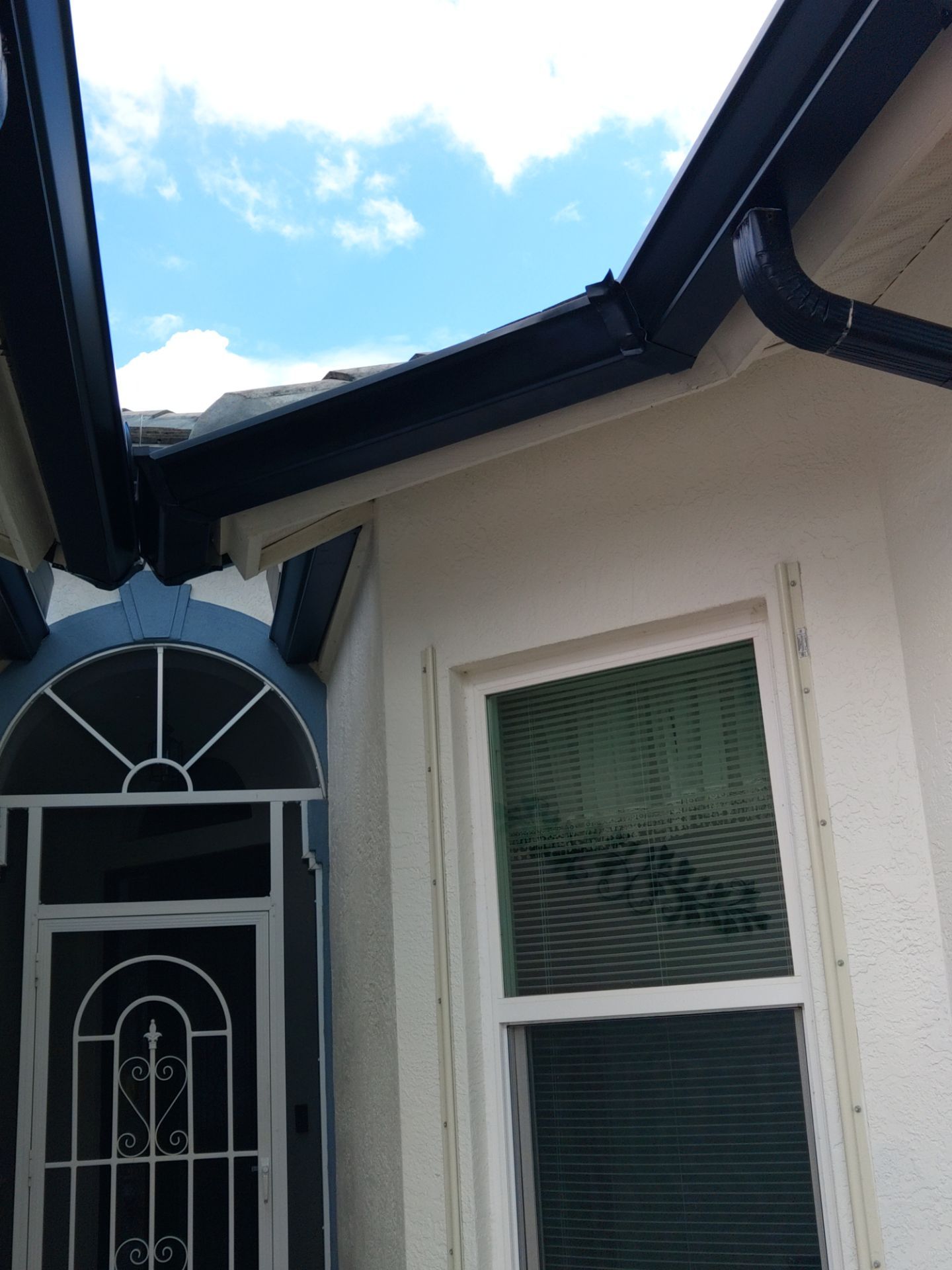 Black Seamless Gutters  by Gutter Professors