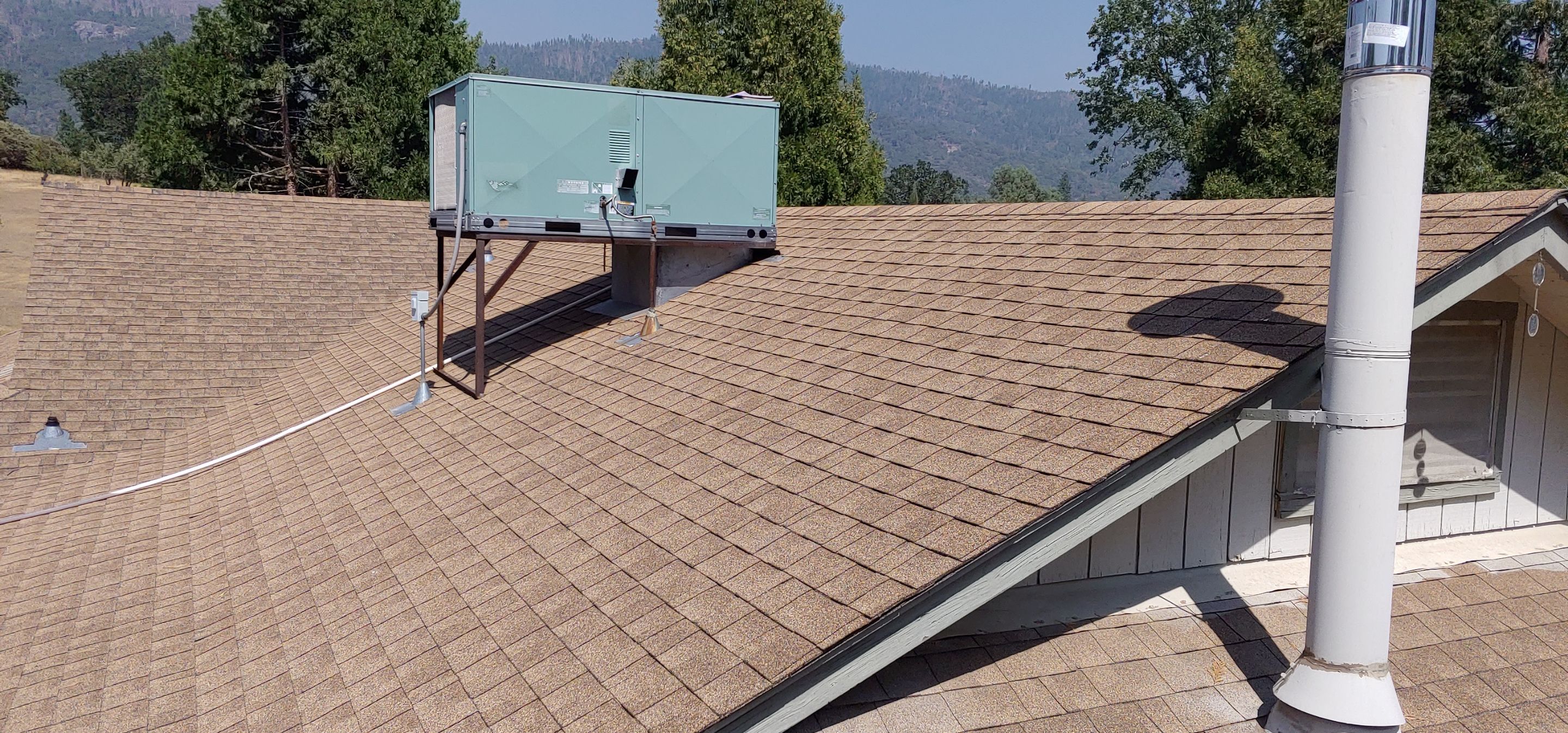 Residential Roofing Installation using Standing seam metal roofing system by Straight Edge Roofing Inc