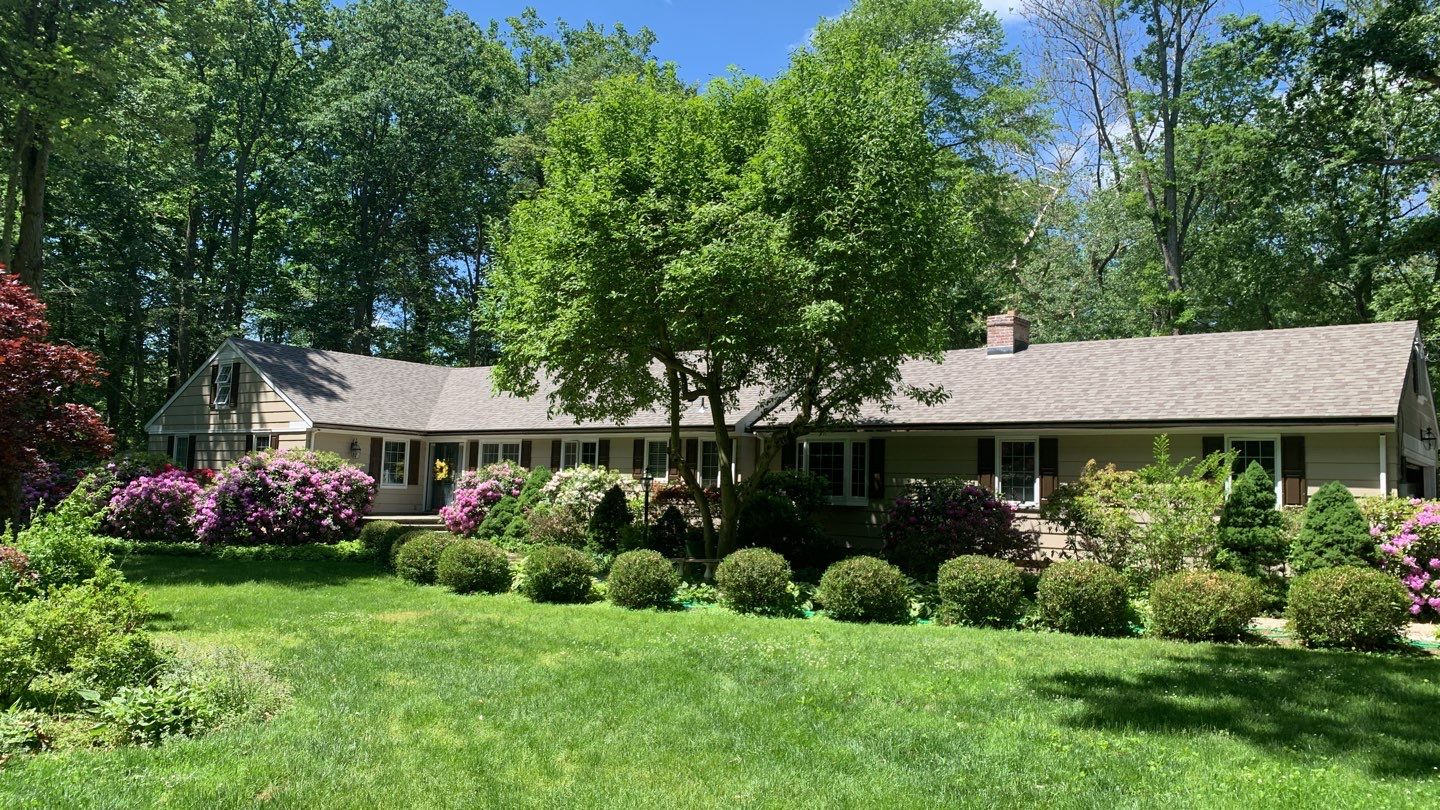 Commercial Roofing Installation using Owens Corning Duration Driftwood by A Plus Exterior