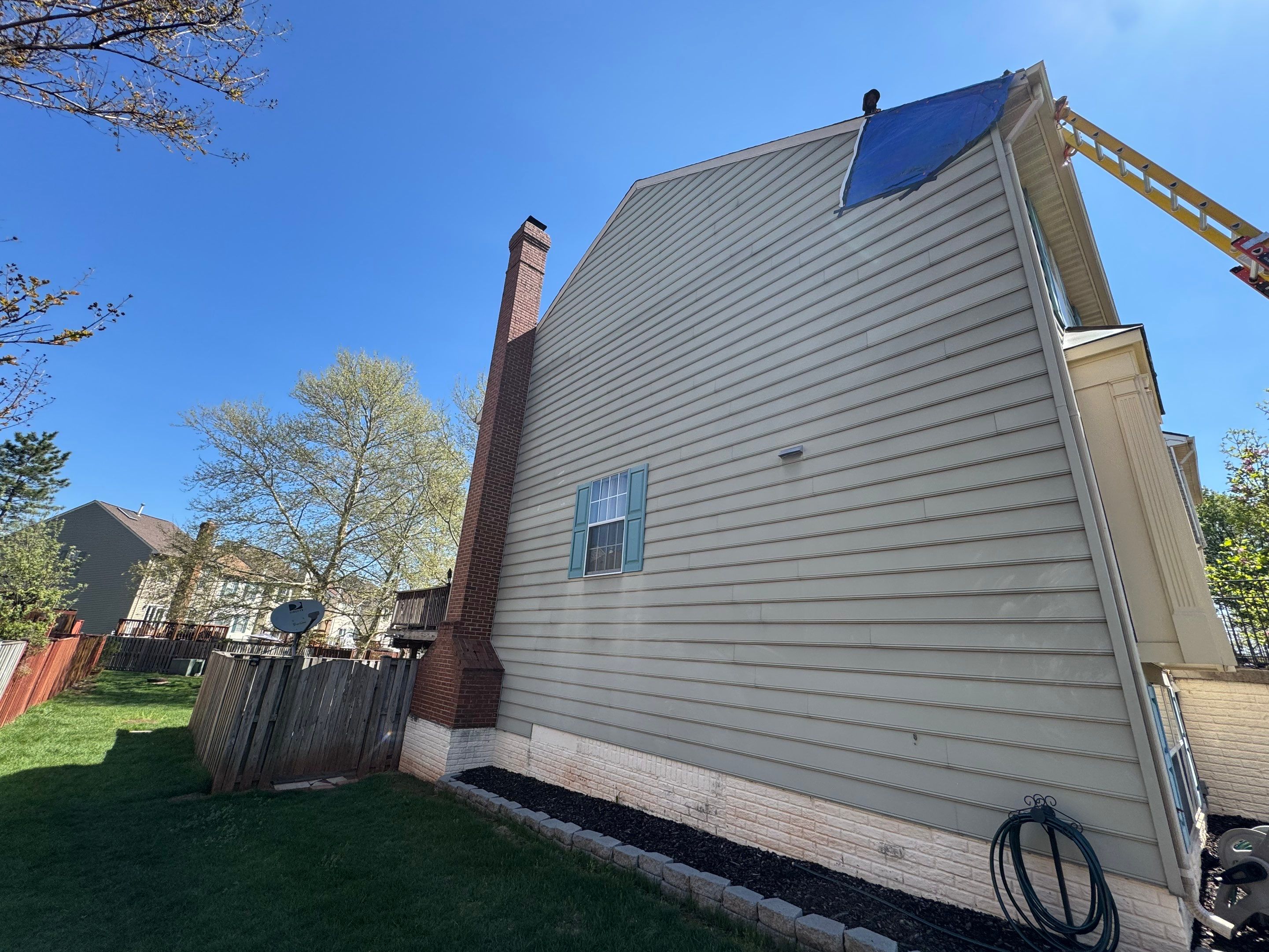 Full Exterior Siding Replacement and Moisture Barrier Installation in Ashburn by Ridge Armor Renovations