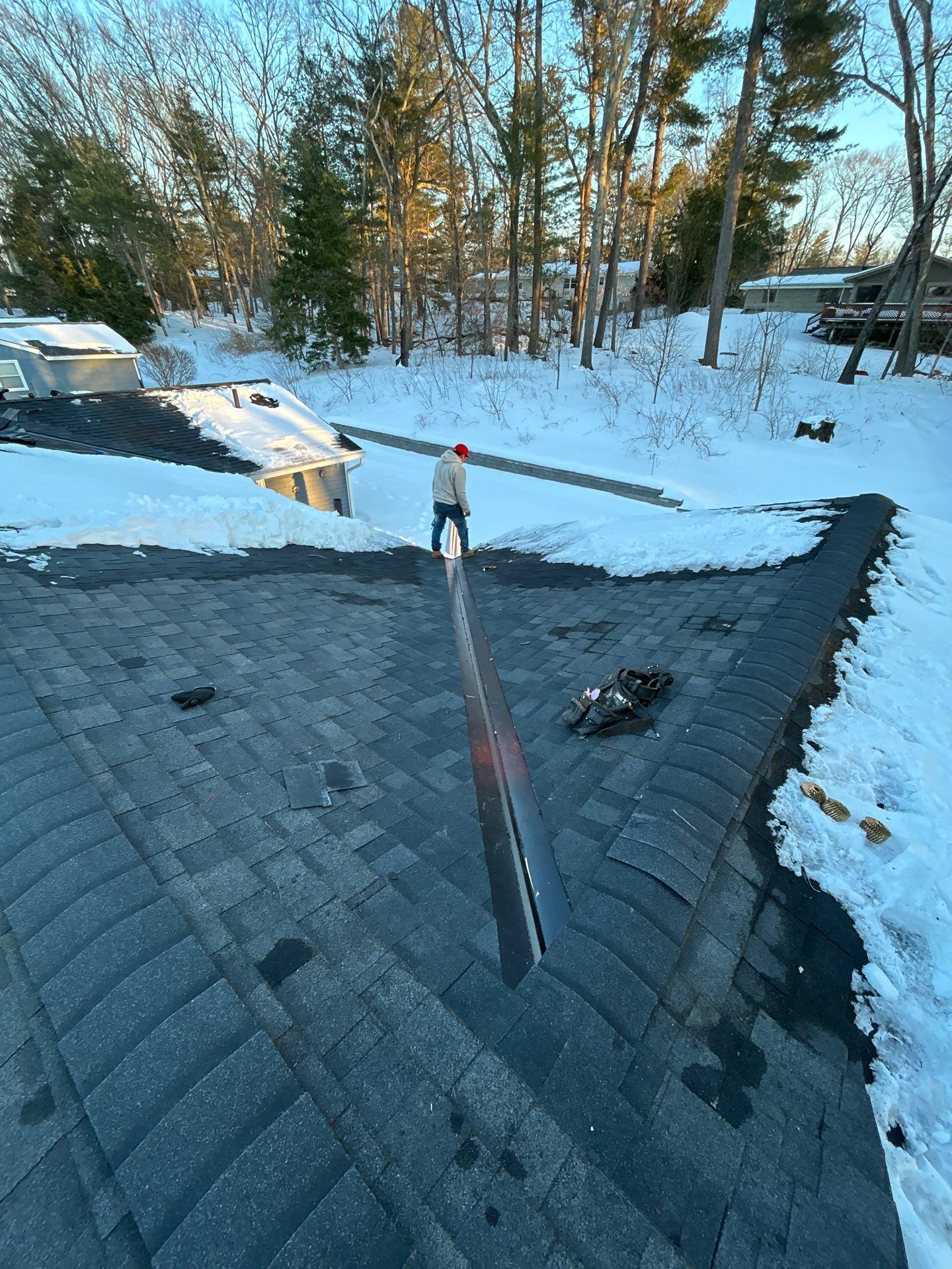 Ridge Cap Replacement & Black Metal Valley Installation in Chelmsford, MA by Mighty Dog Roofing of Greater Middlesex County