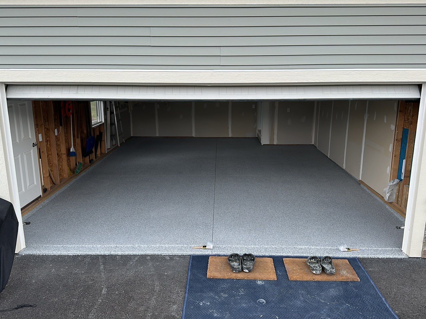 Silverado garage floor coating  by NG Masonry & Construction LLC