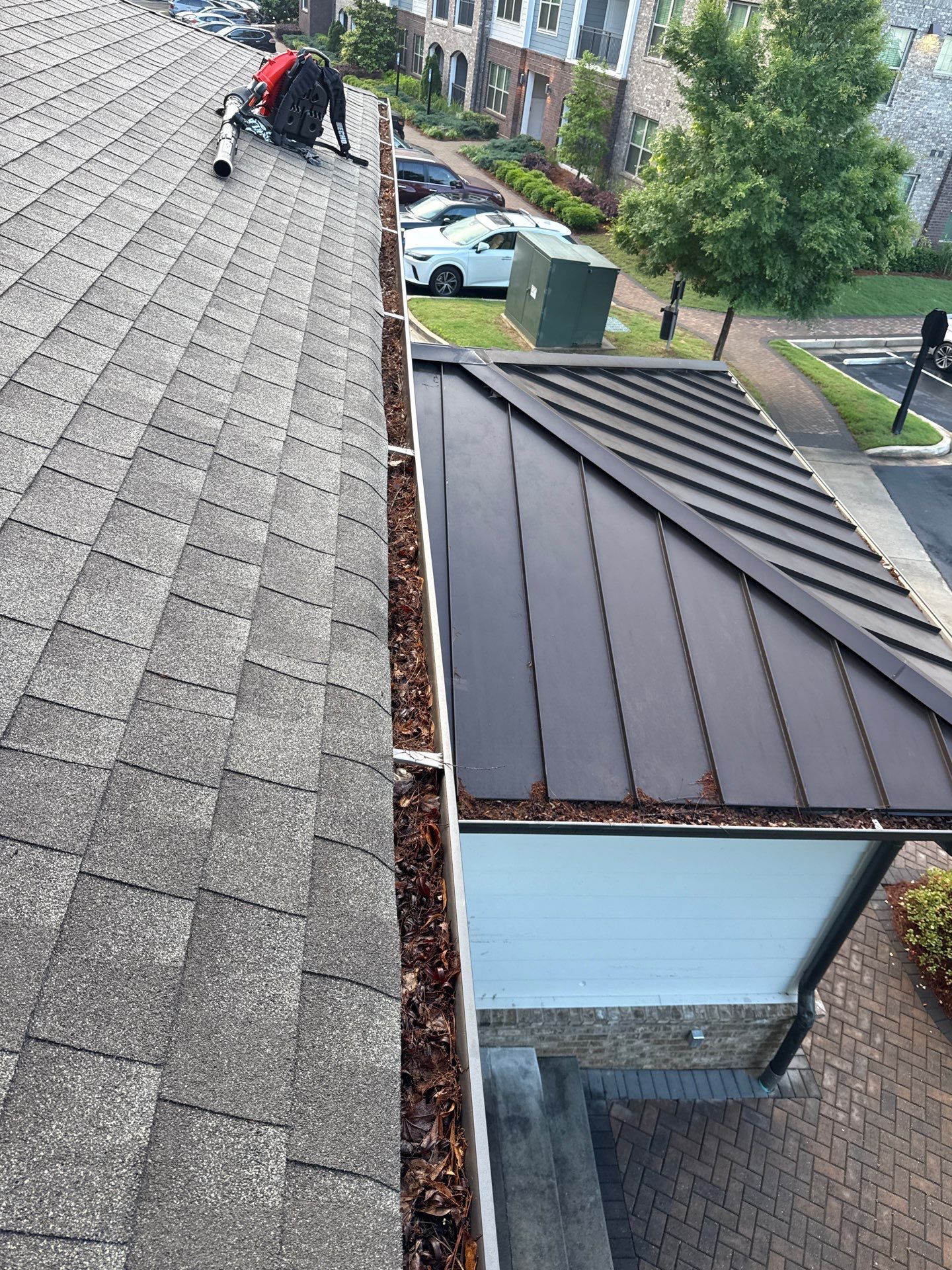 HOA gutter cleaning before photo.