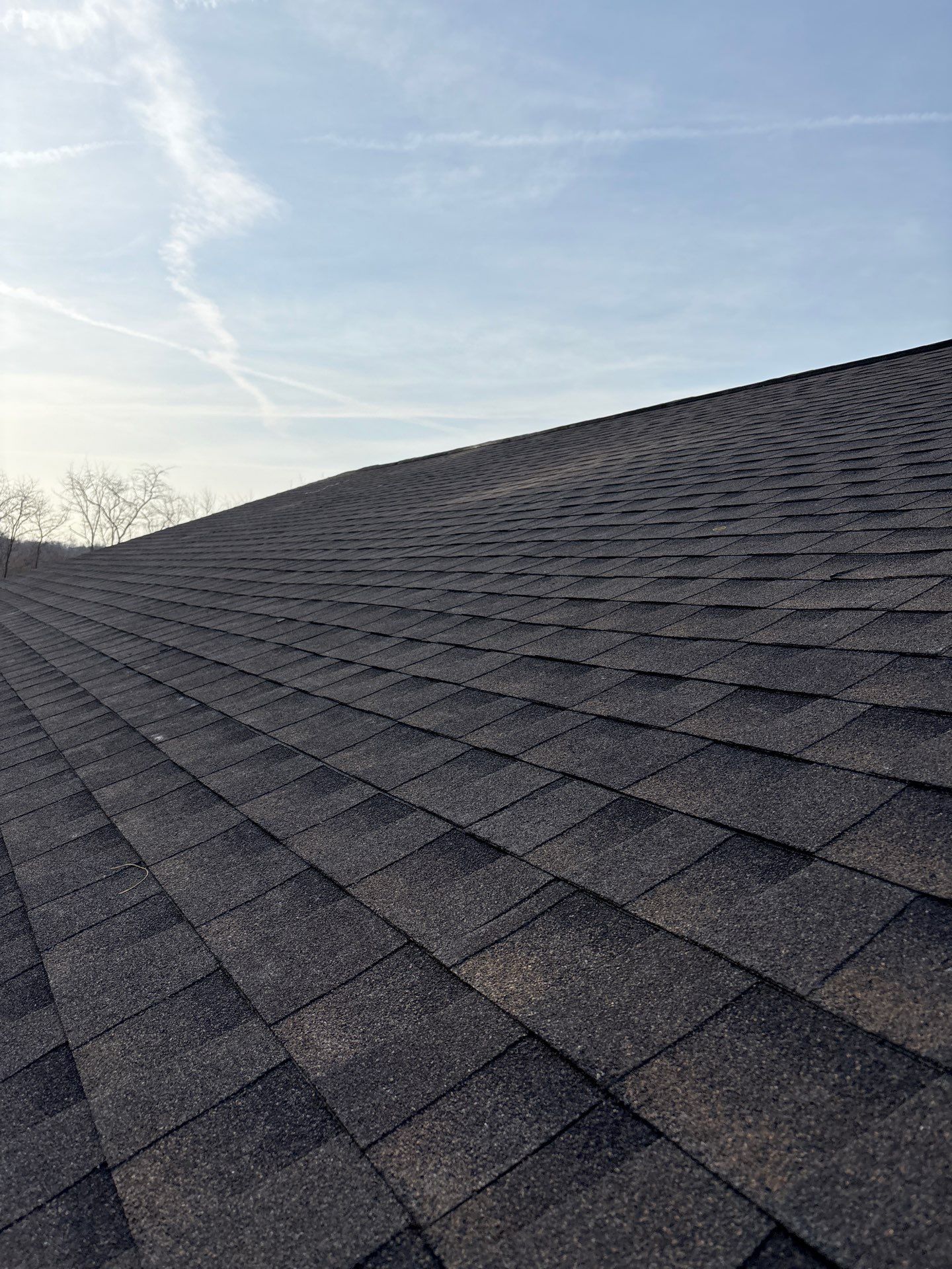 Residential Roofing Installation using GAF Timberline HDZ Charcoal by Rainstoppers Roofing