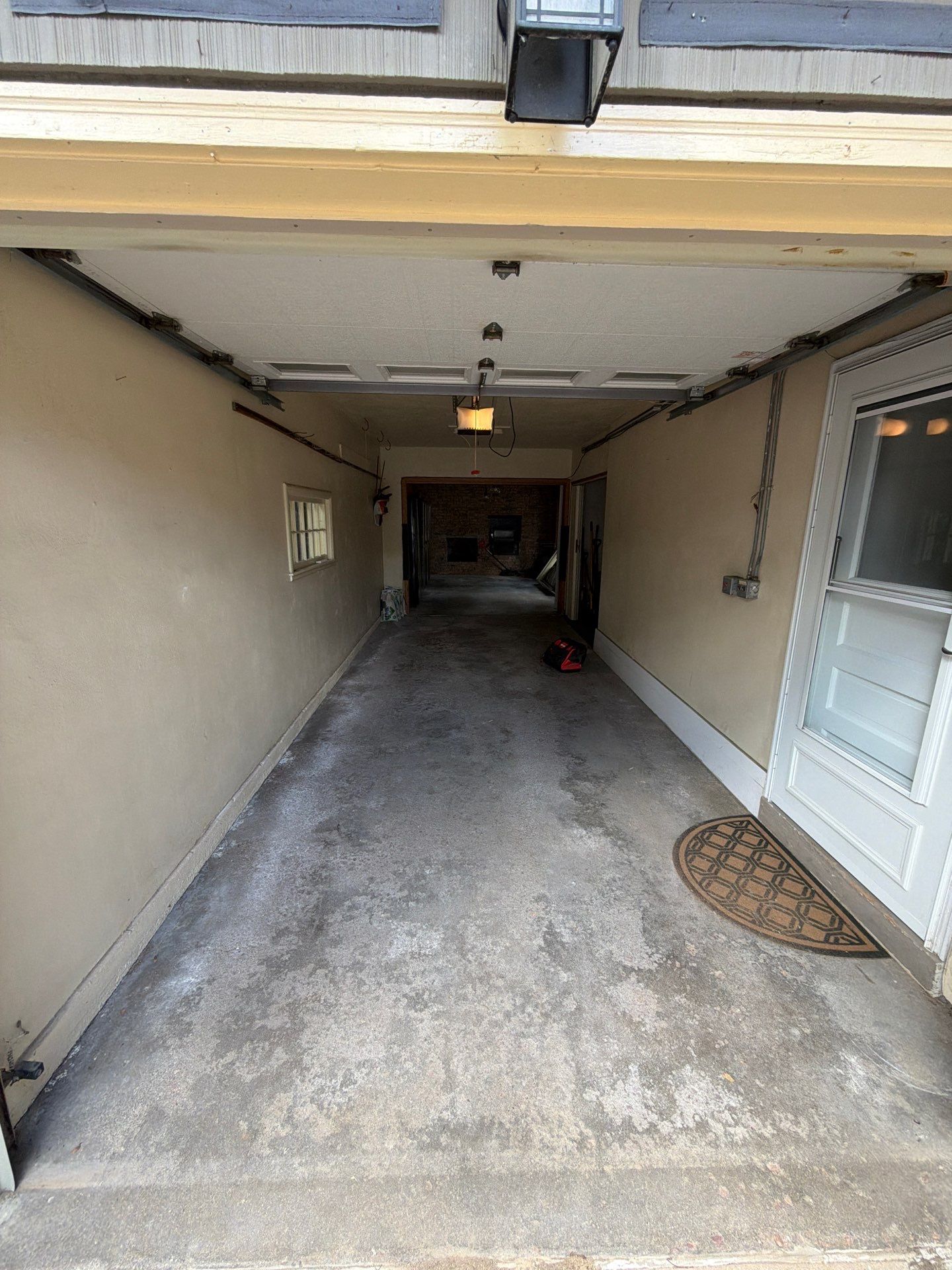 Sioux Falls Garage and Sunroom Concrete Coating with Coyote Flake by Select Painting, Coatings & Garage Cabinets