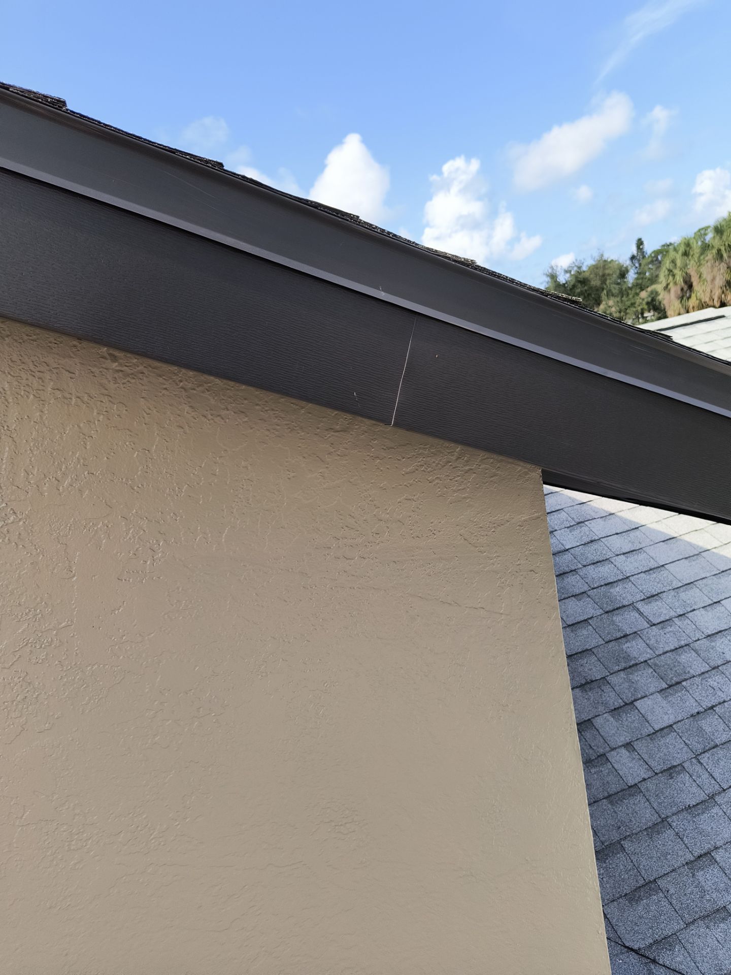 Black Seamless Gutters in Sarasota FL by Gutter Professors