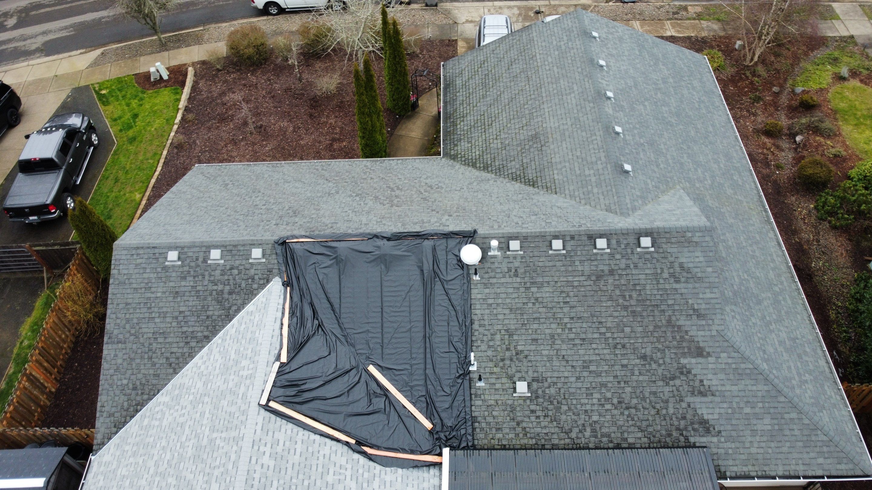 Residential Roofing Installation using IKO Cambridge (Color: Dual Grey) by Orezona Building & Roofing Company, Inc.
