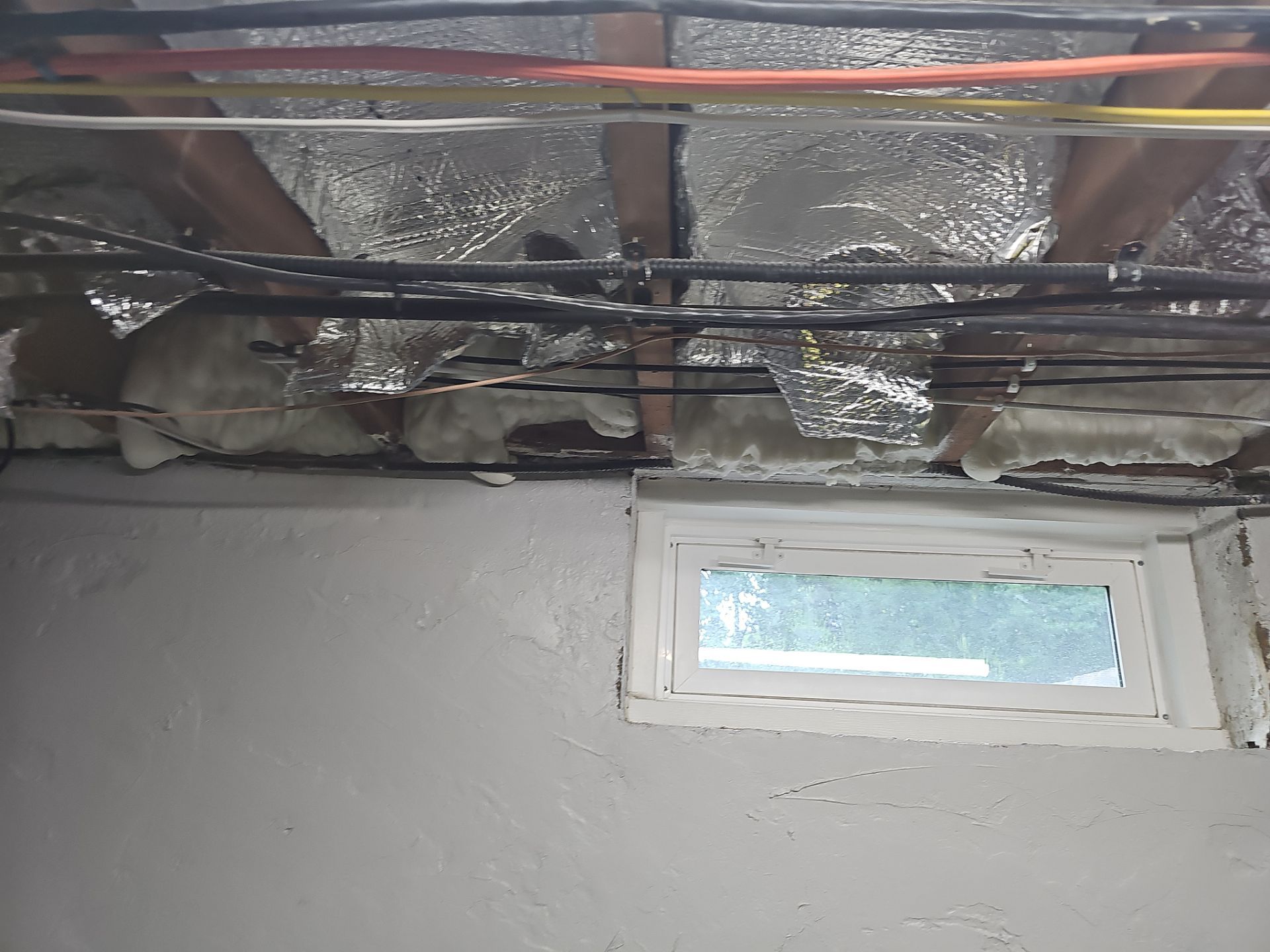 Attic Insulation using open cell spray foam by NYS Foam & Energy
