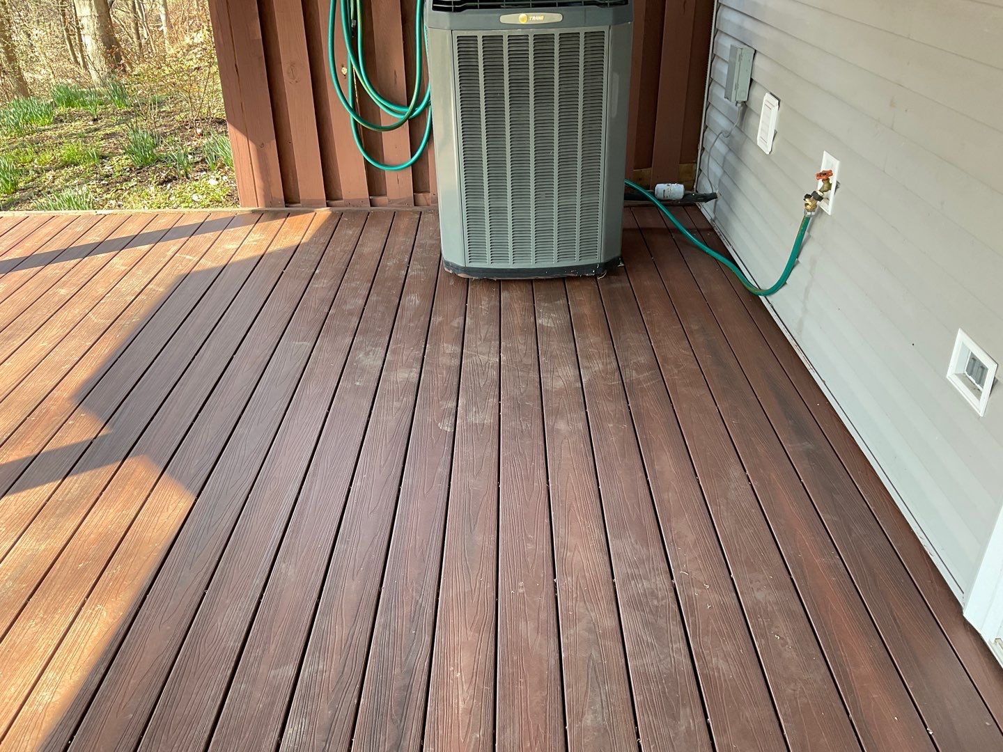 Deck Installation using New Composite Deck Board by Alpha Design Services