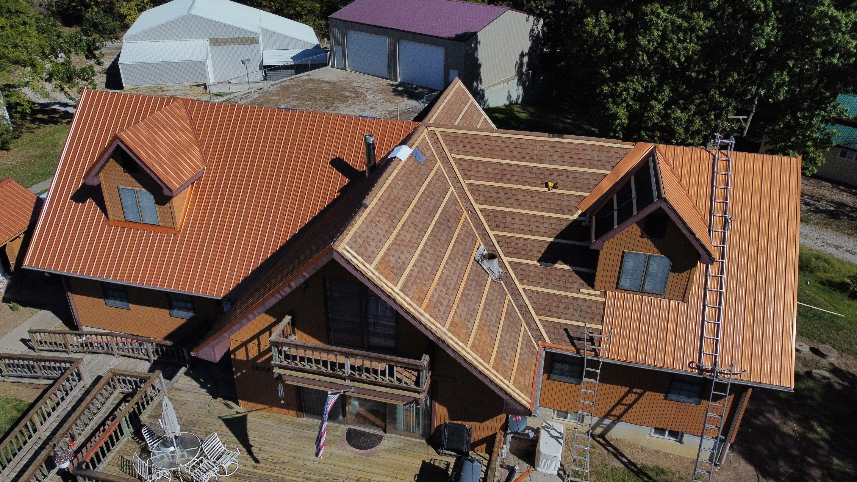 Residential Roofing & Snowguard Install - 29 Gauge G-Rib Metal - Color Copper Metallic  by Titan Commercial & Residential Roofing 