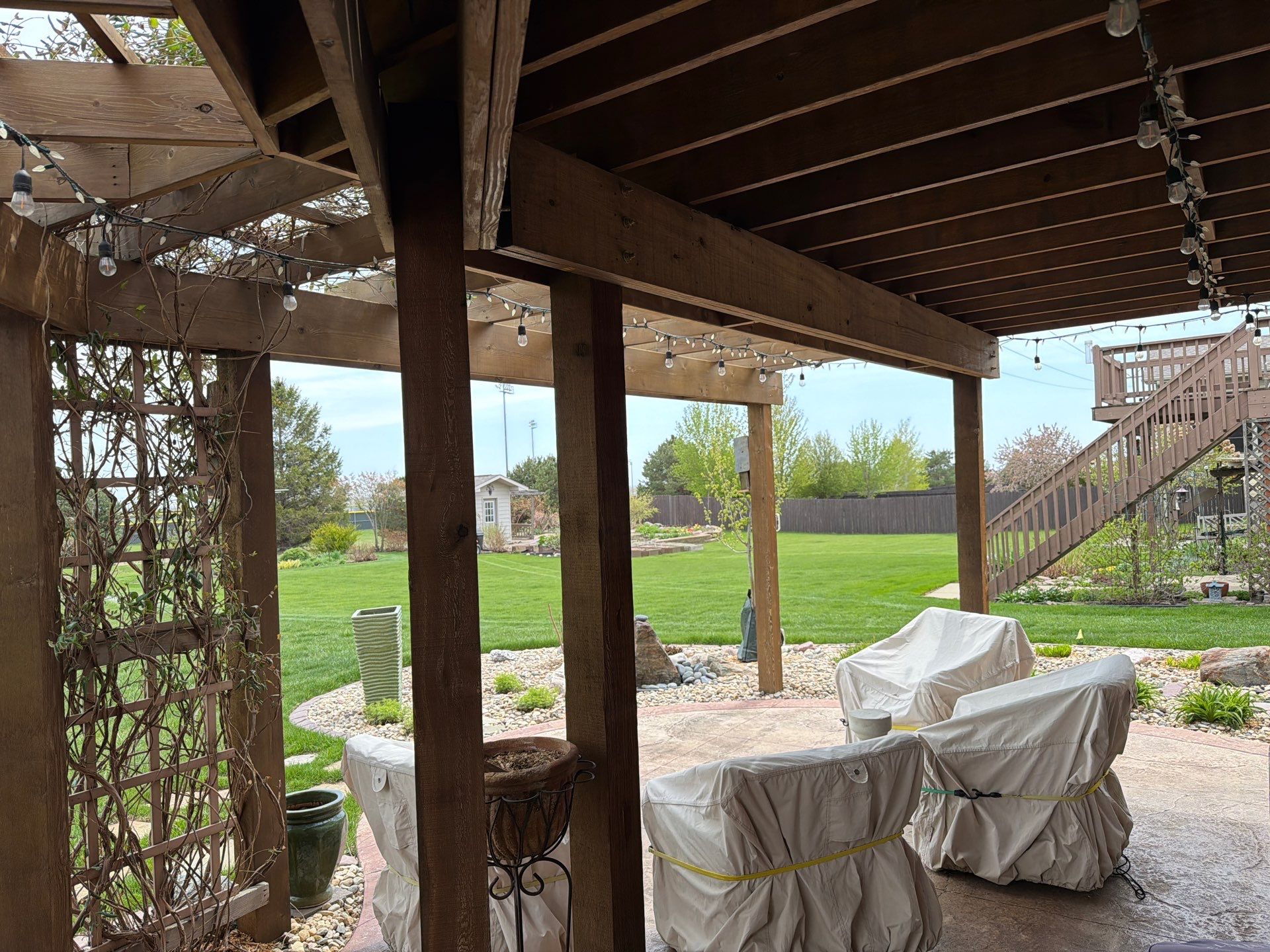 Tiered Wood Deck and Pergola Refinishing in Sioux Falls by Select Painting, Coatings & Garage Cabinets