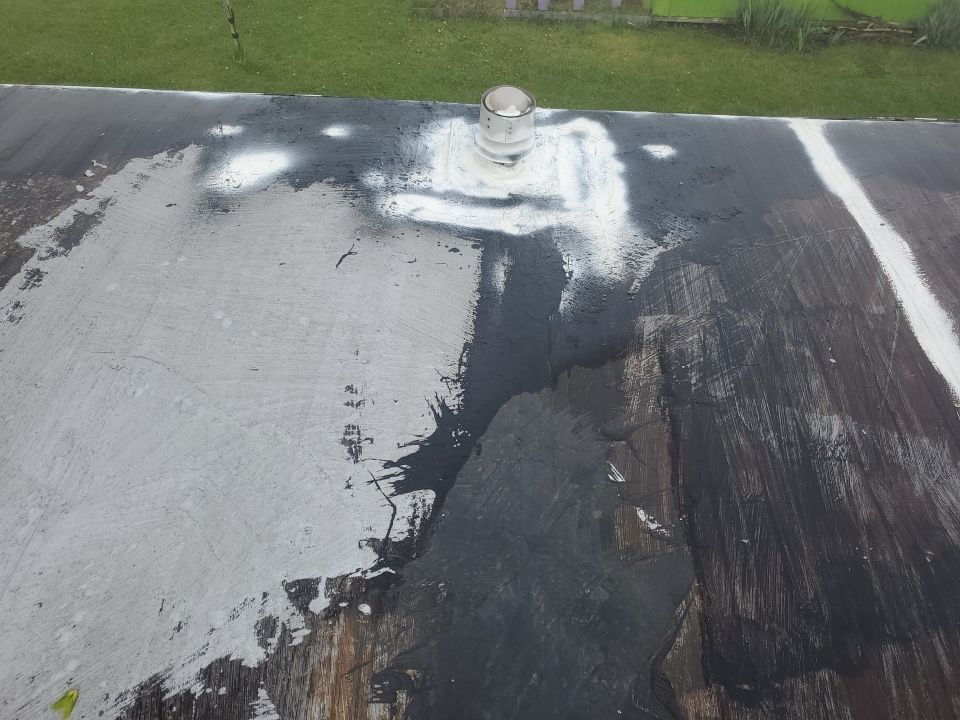 Residential Roofing Installation using 60 mil rubber roof  by Nitro Roofing and Construction