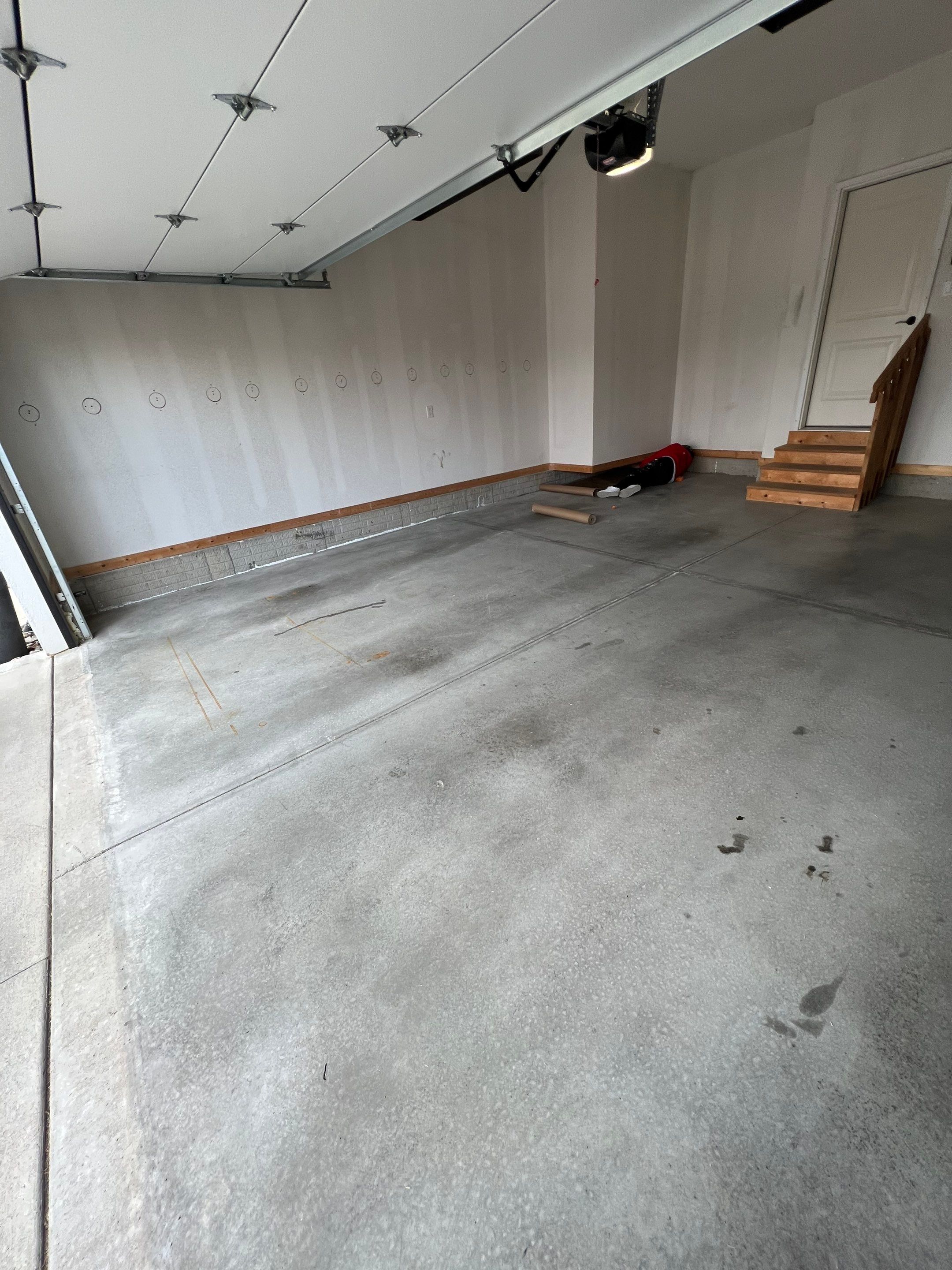 Garage painting and new floor by Cutting edge painting 