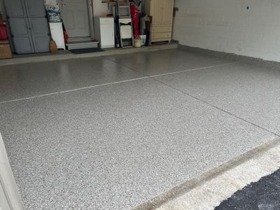 Pebble Beach Coating in LaPorte! by Innovative Spaces / Innovative Concrete Coatings