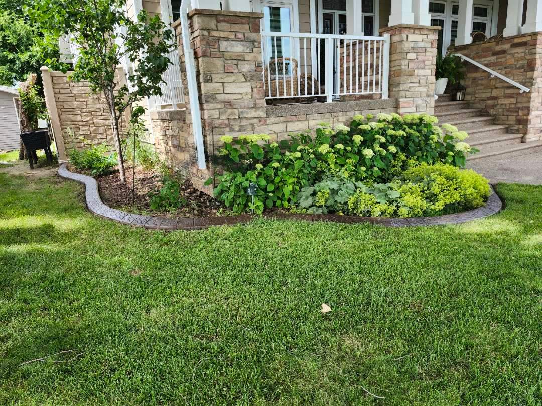 Decorative Stamped Concrete Landscape Edging Installation in Medicine Hat by Pump it Up Concrete Jacking