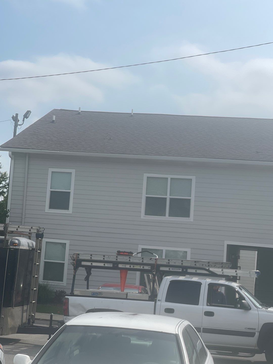 Residential Roofing Installation using Roof Replacement by American Roofing & Construction LLC