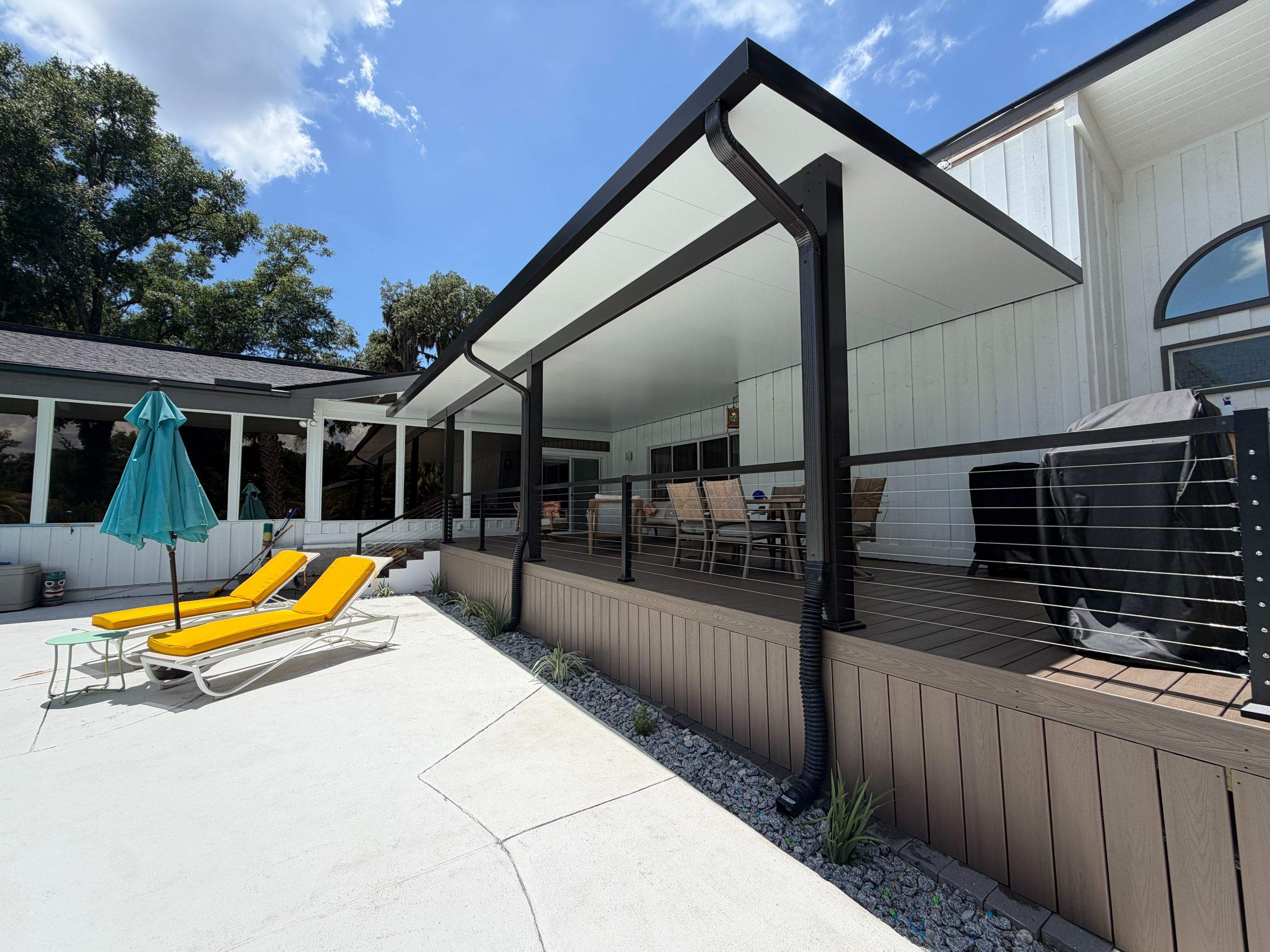 Aluminun patio cover using Deckorators venture by Orlando pergolas