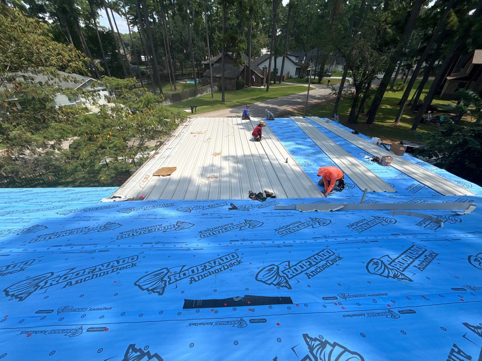 White Standing Seam Metal Roof Replacement in Willis, Texas by Abbott Roofing Company