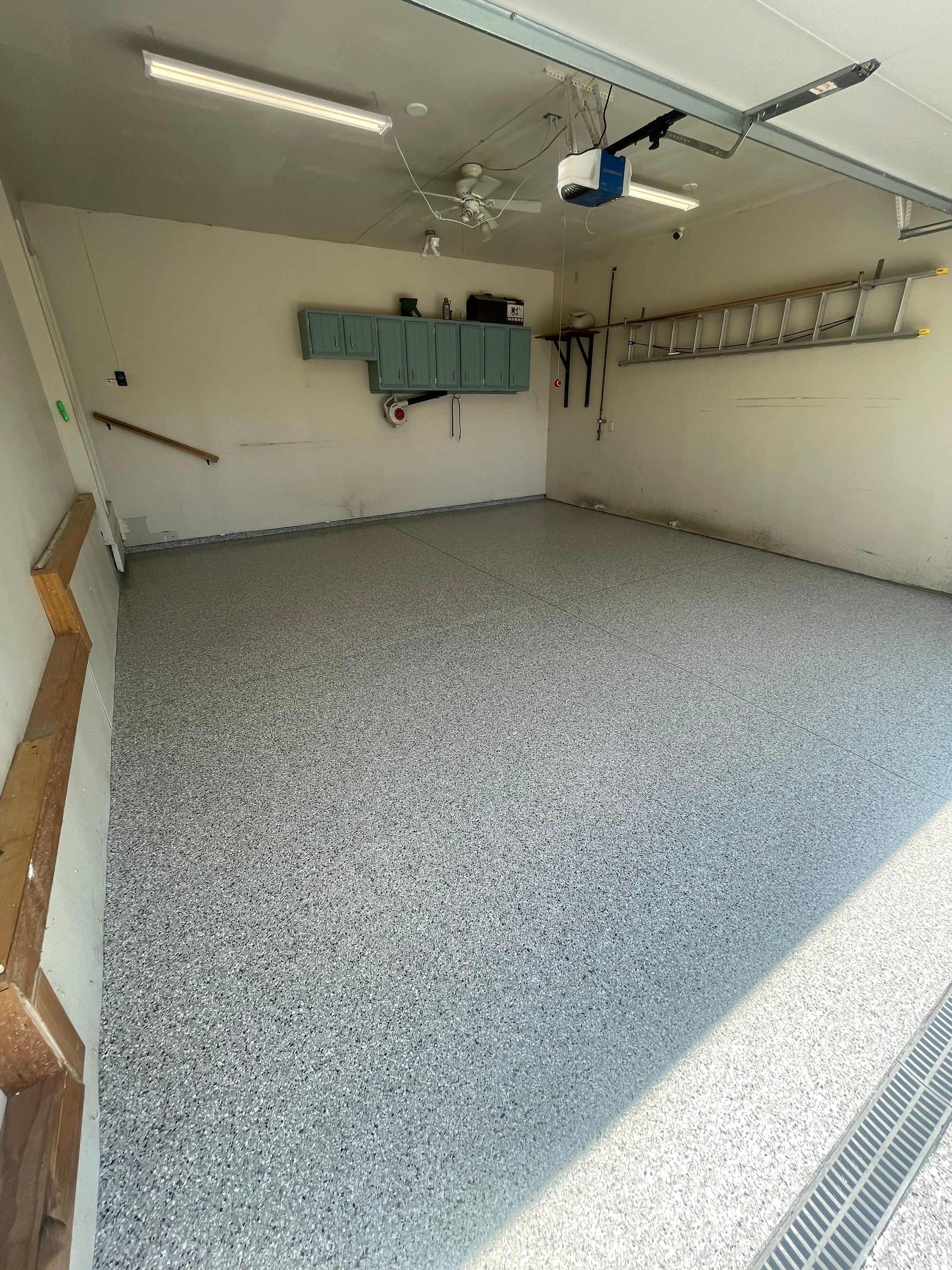 Multi-Stall Garage Floor Coating Installation in Sioux Falls by Select Painting, Coatings & Garage Cabinets