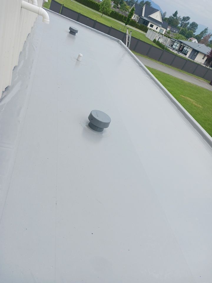 Residential Shop flat roofing Installation using Durolast membrane by Top Notch Roofing Inc