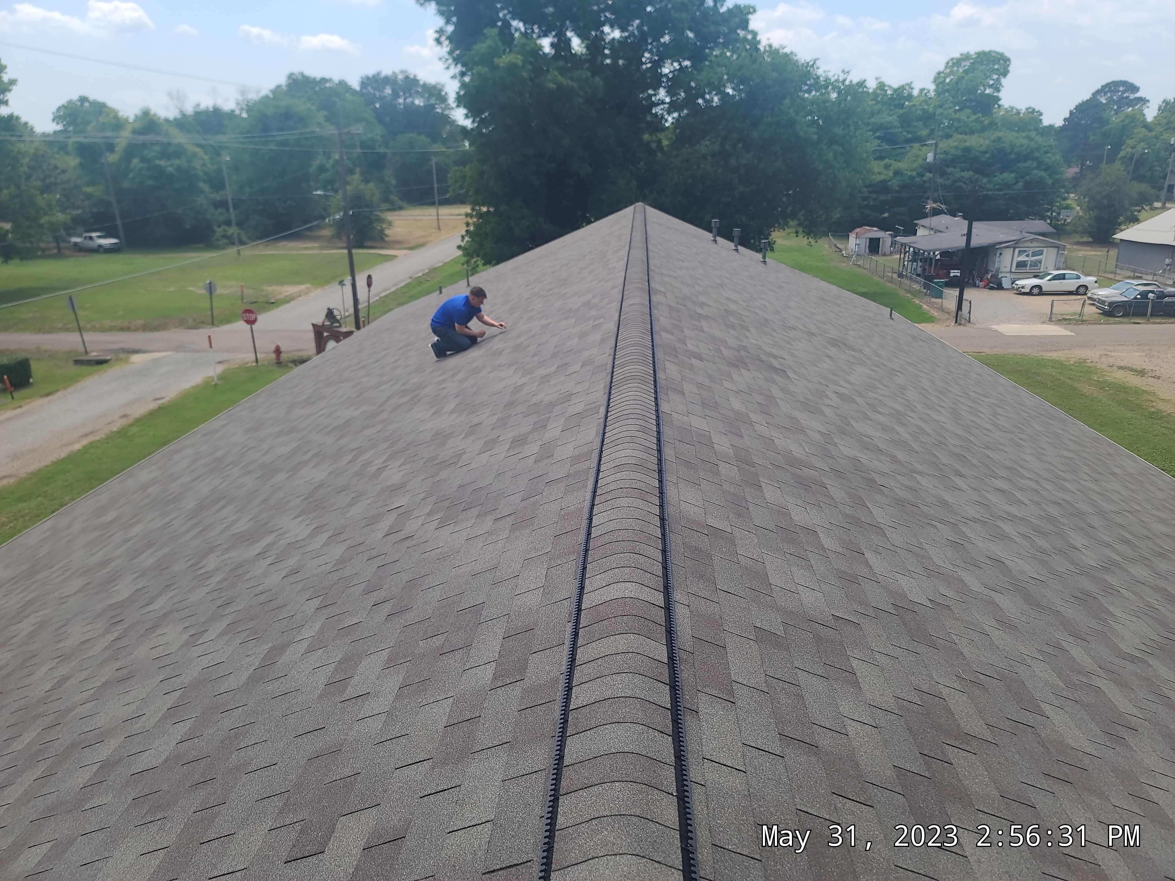 Storm Restoration Reroof: 25 Year 3-Tab Shingle by Hostetler Roofing