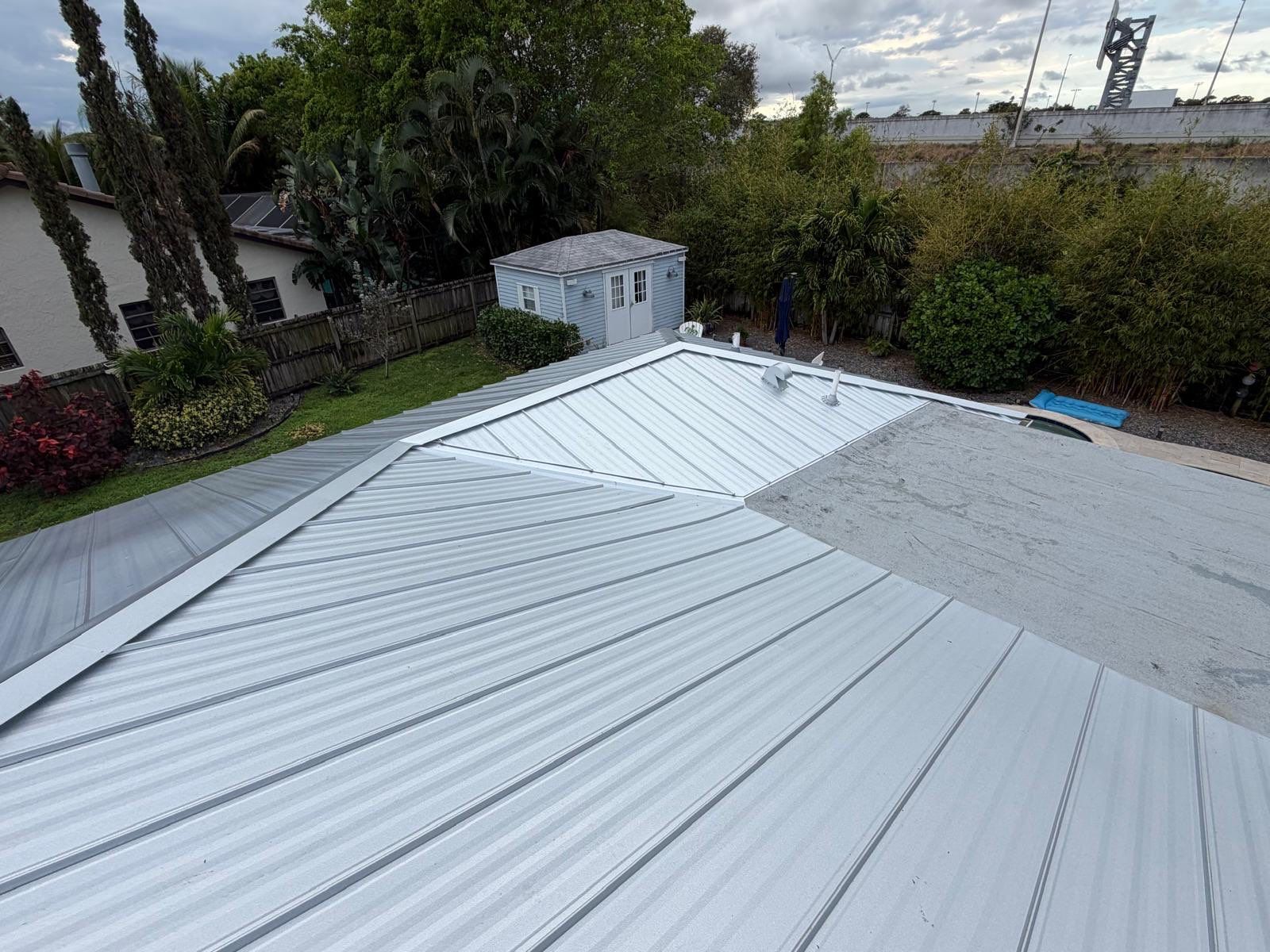 Residential Roofing Installation using 1" Nail strip metal roof by BLUES BROTHERS CONSTRUCTION CORP