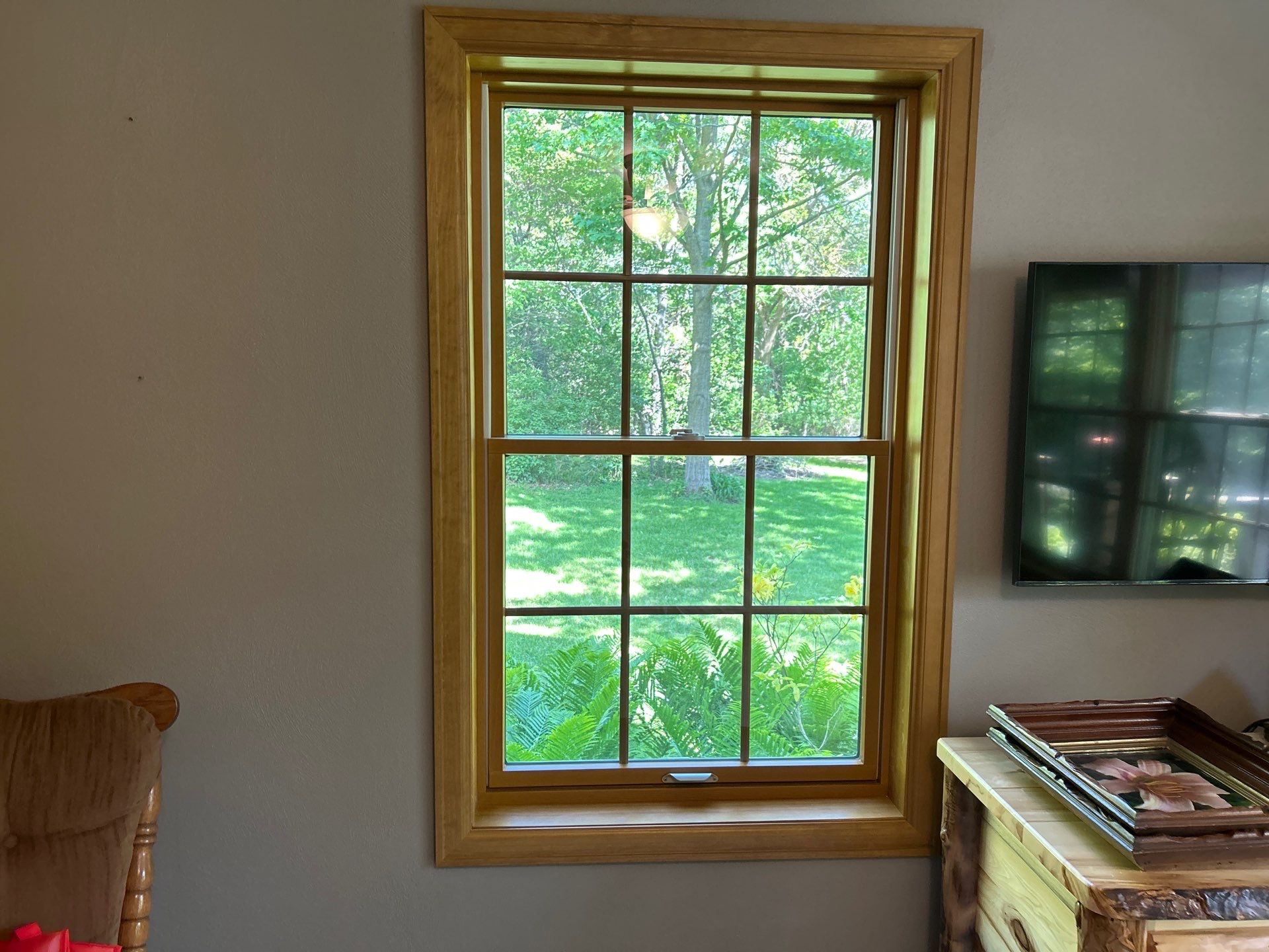 Pella Window installation using Pella Lifestyle wood/Aluminum window by United Windows and Siding LLC