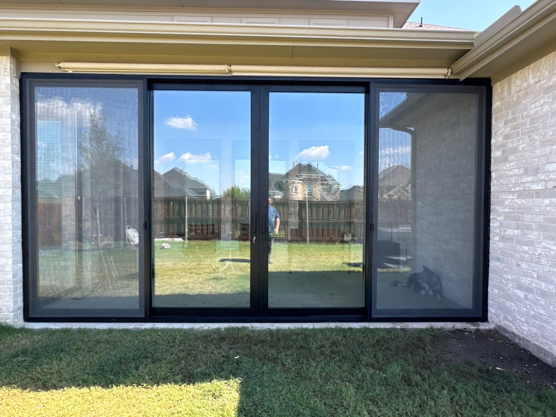 Year-Round Bonus Room: Patio Enclosure Featuring 16ft Seamless Sliding Glass by Tibi Soli LLC