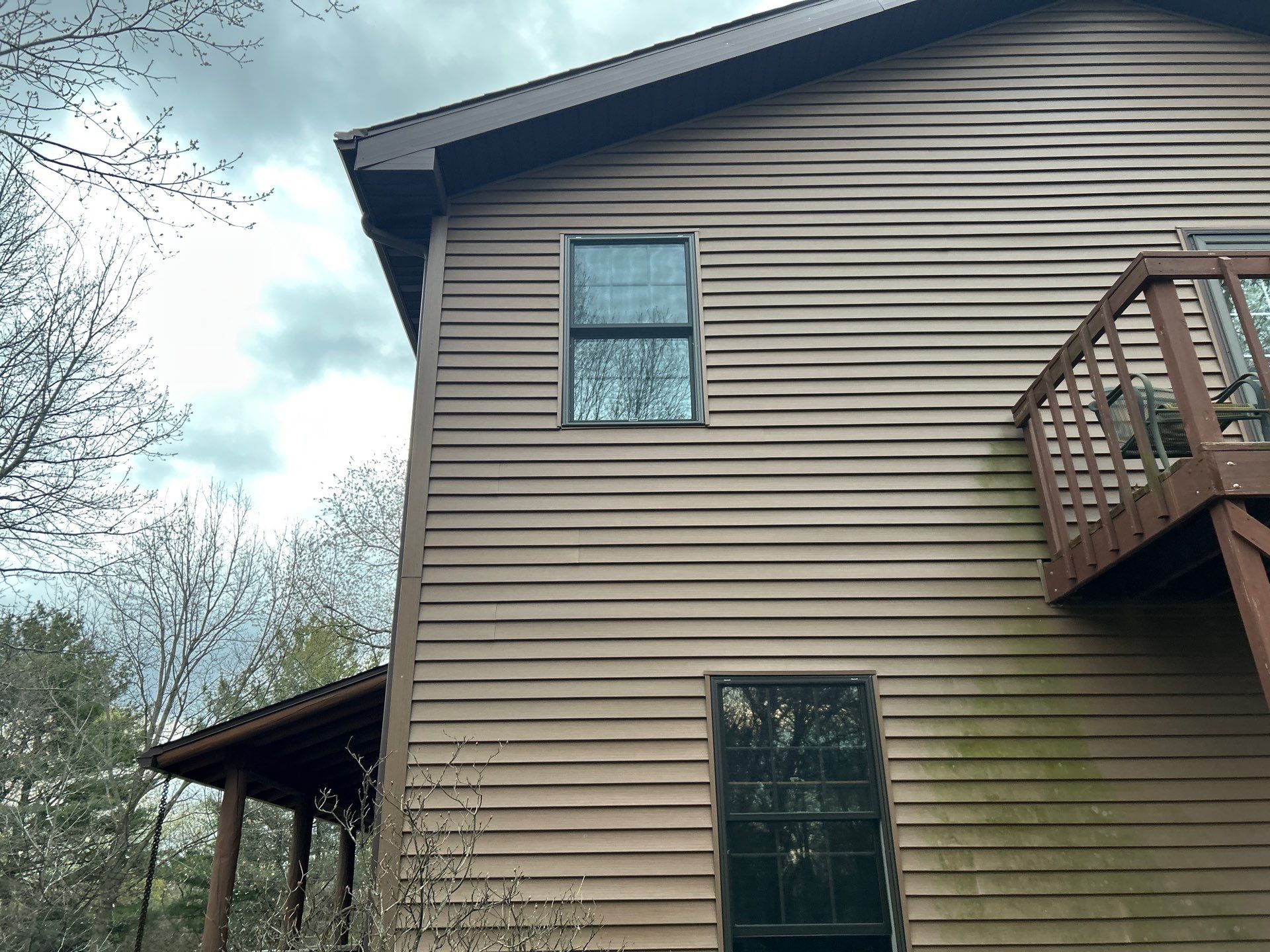 Pella Window installation using Pella Lifestyle wood/Aluminum window by United Windows and Siding LLC