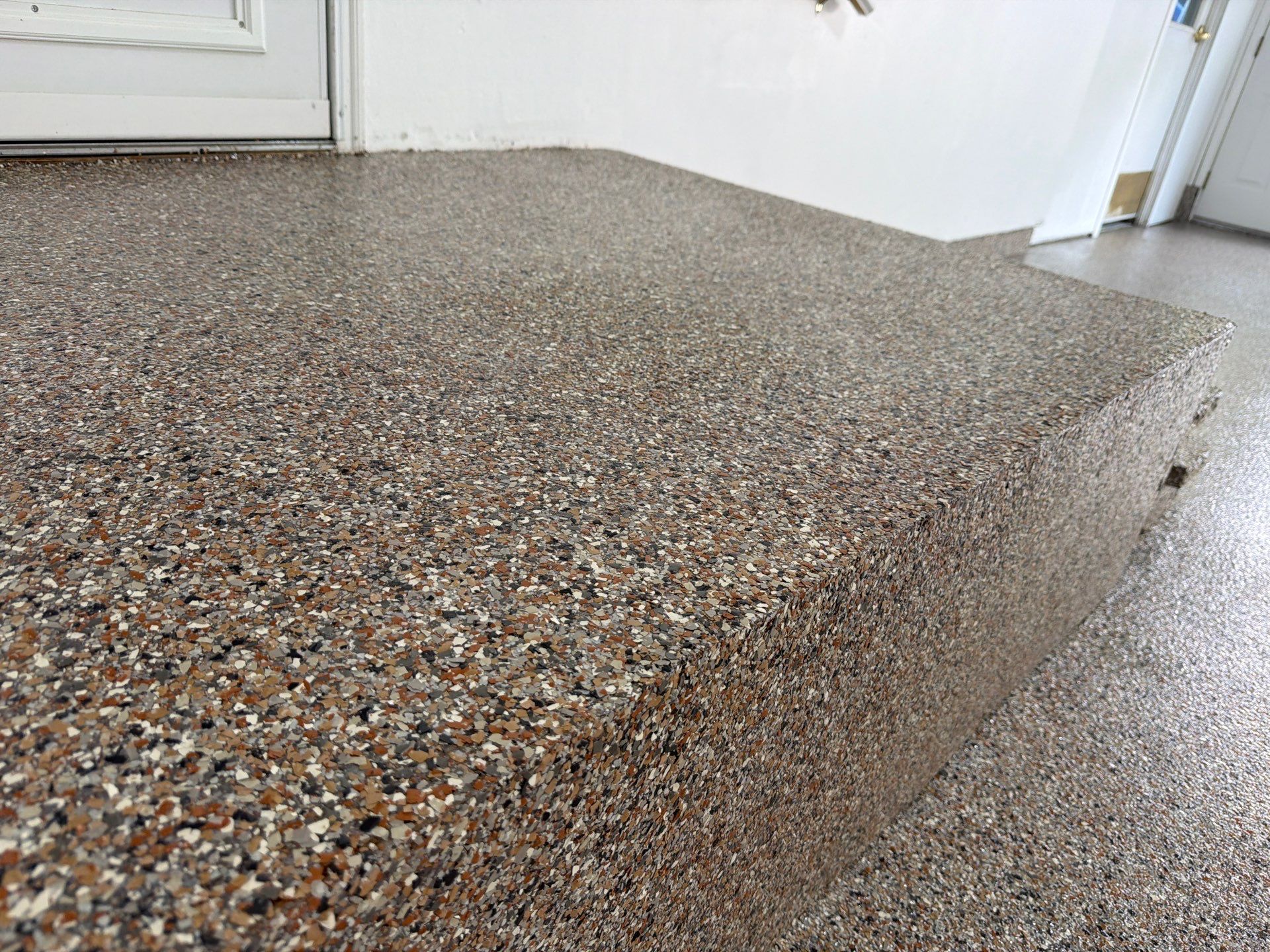 Multi-Colored Epoxy Flake Garage Floor Installation in Fruitport by Gordon Painting