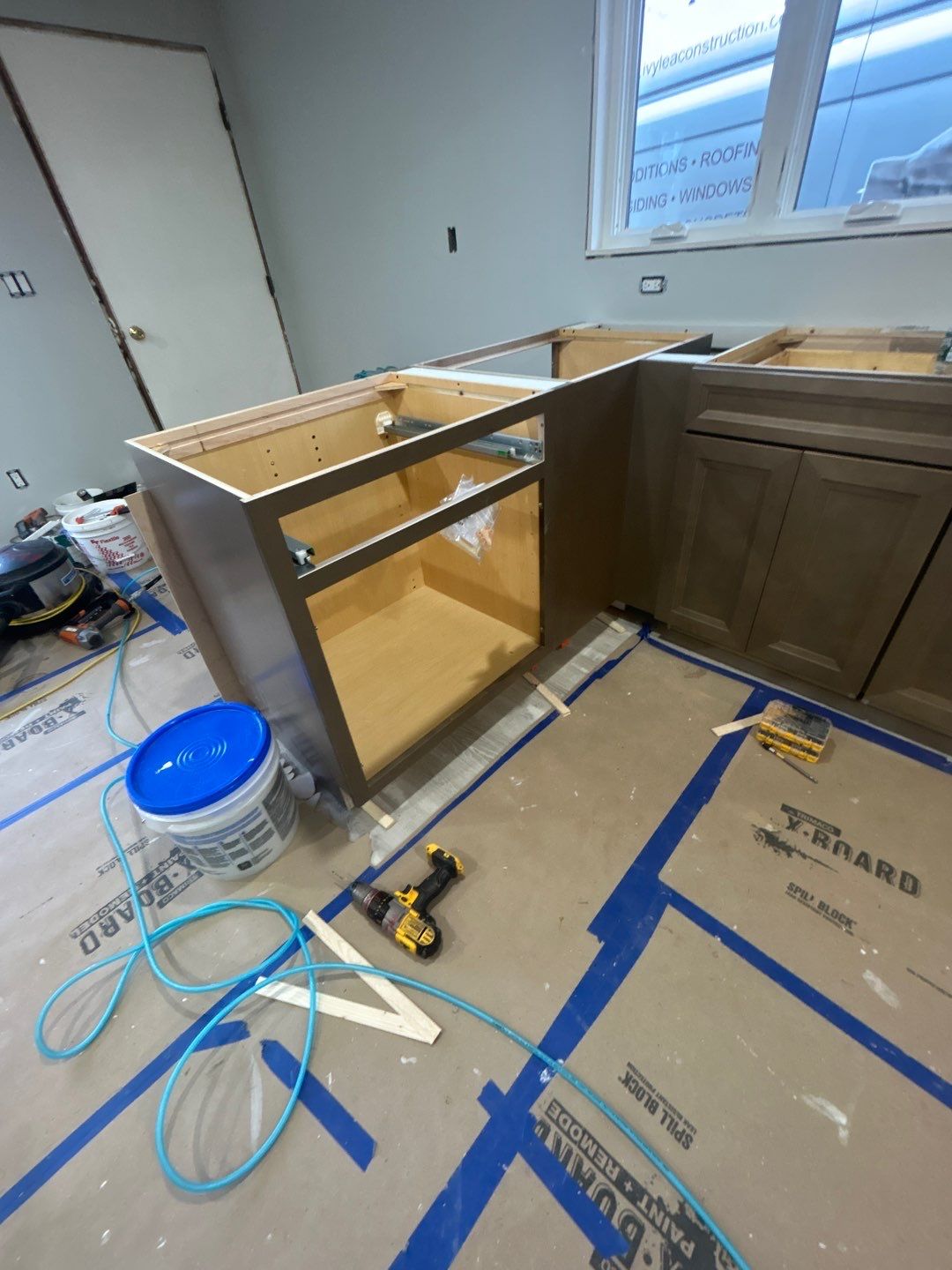 Interior Renovations, Kitchen Remodel, and Window Replacement by Ivy Lea Construction
